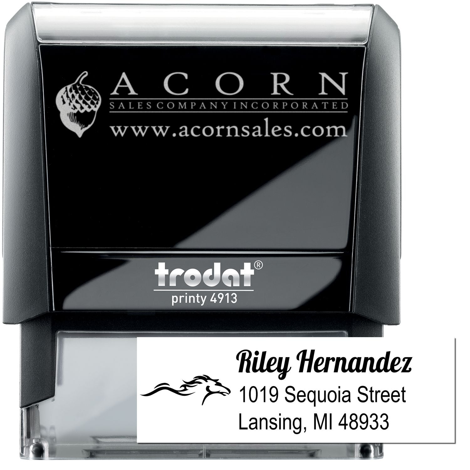 Trodat Printy 4913 self-inking rubber stamp with custom logo and address imprint for business mailing.