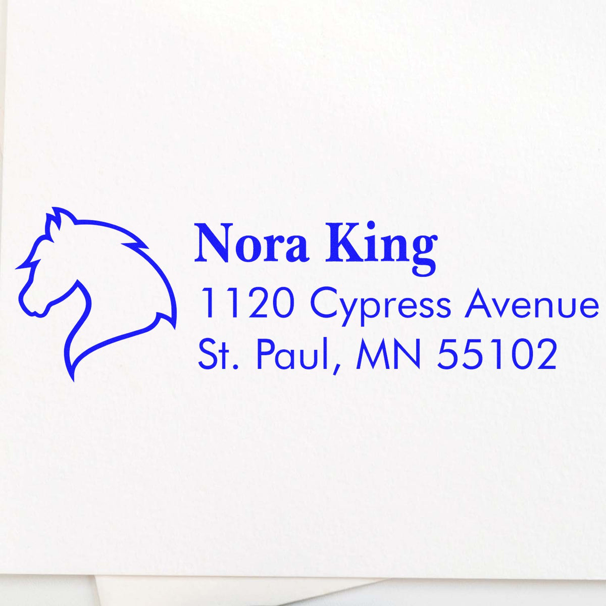 Custom horse logo address stamp for Nora King, 1120 Cypress Avenue, St. Paul, MN 55102