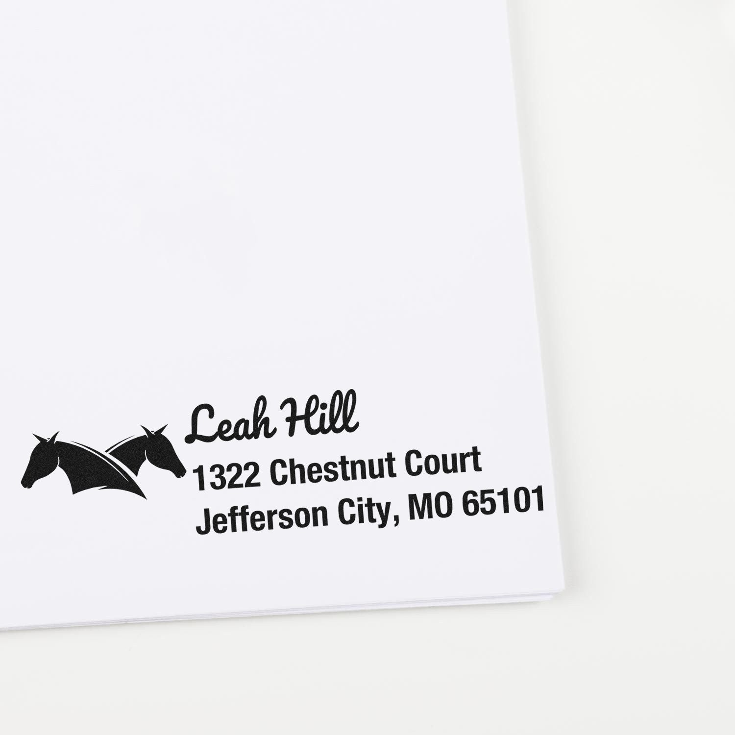 Custom horse logo address rubber stamp for Leah Hill, 1322 Chestnut Court, Jefferson City, MO 65101.