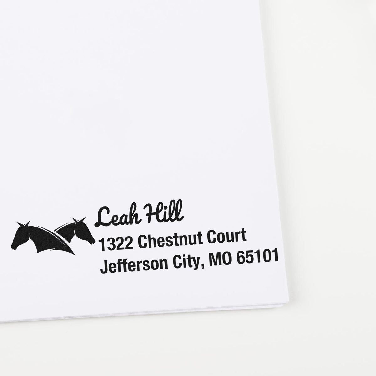 Custom horse address rubber stamp for Leah Hill, 1322 Chestnut Court, Jefferson City, MO 65101