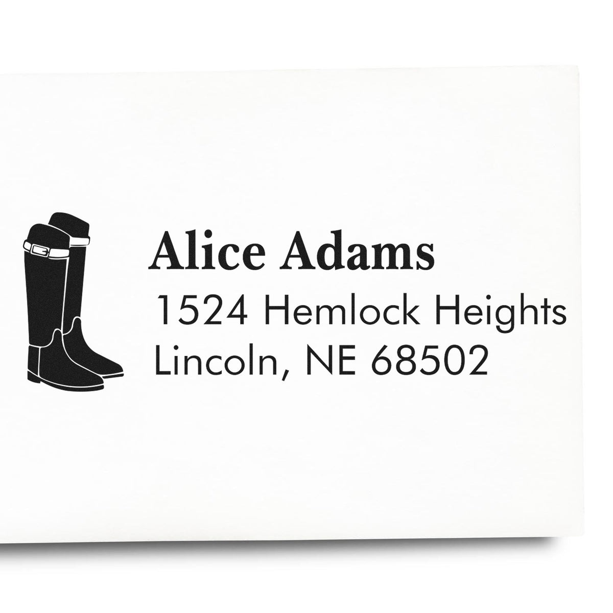 Custom rubber stamp with cowboy boots icon and return address for Alice Adams, Lincoln, NE 68502.