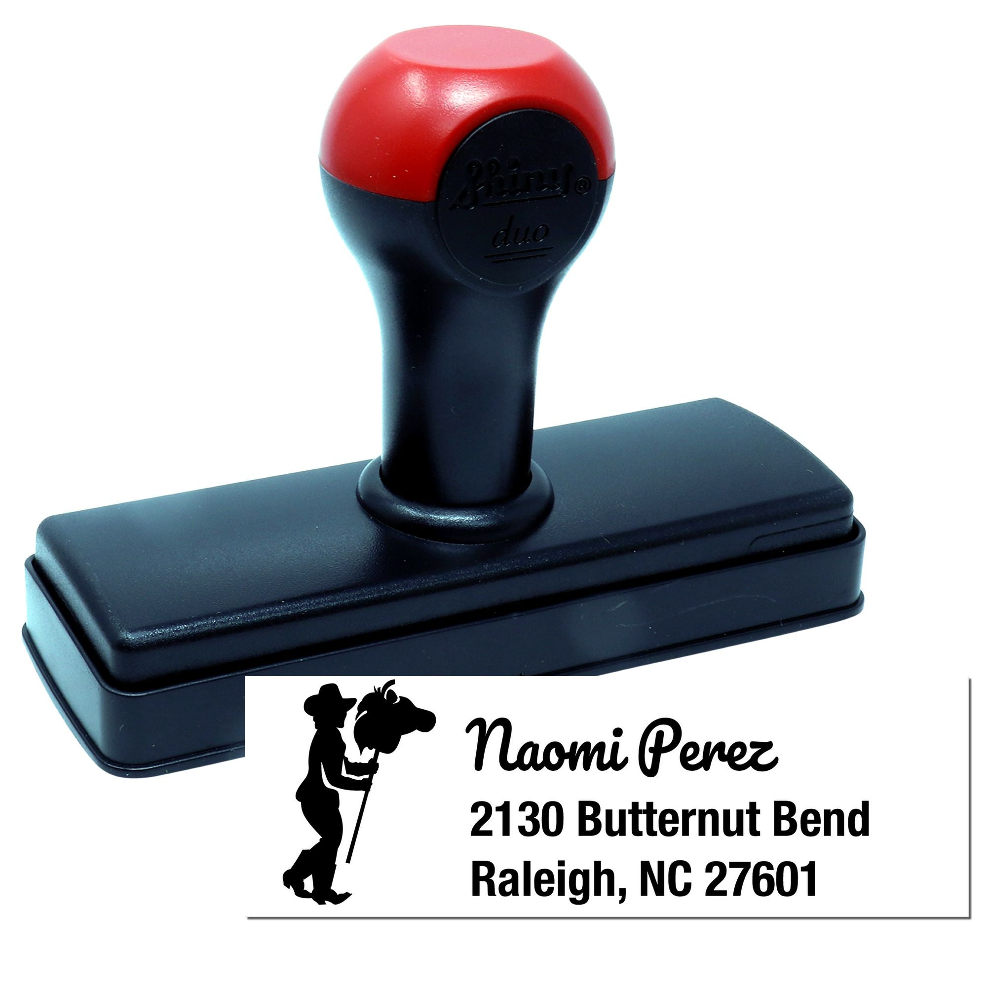 Custom self-inking return address rubber stamp with personalized name and address imprint for envelopes and mailings.