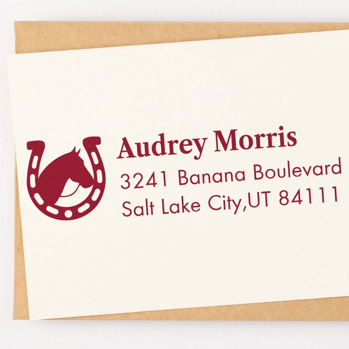Personalized horse-and-horseshoe return address rubber stamp for Audrey Morris, Salt Lake City, UT