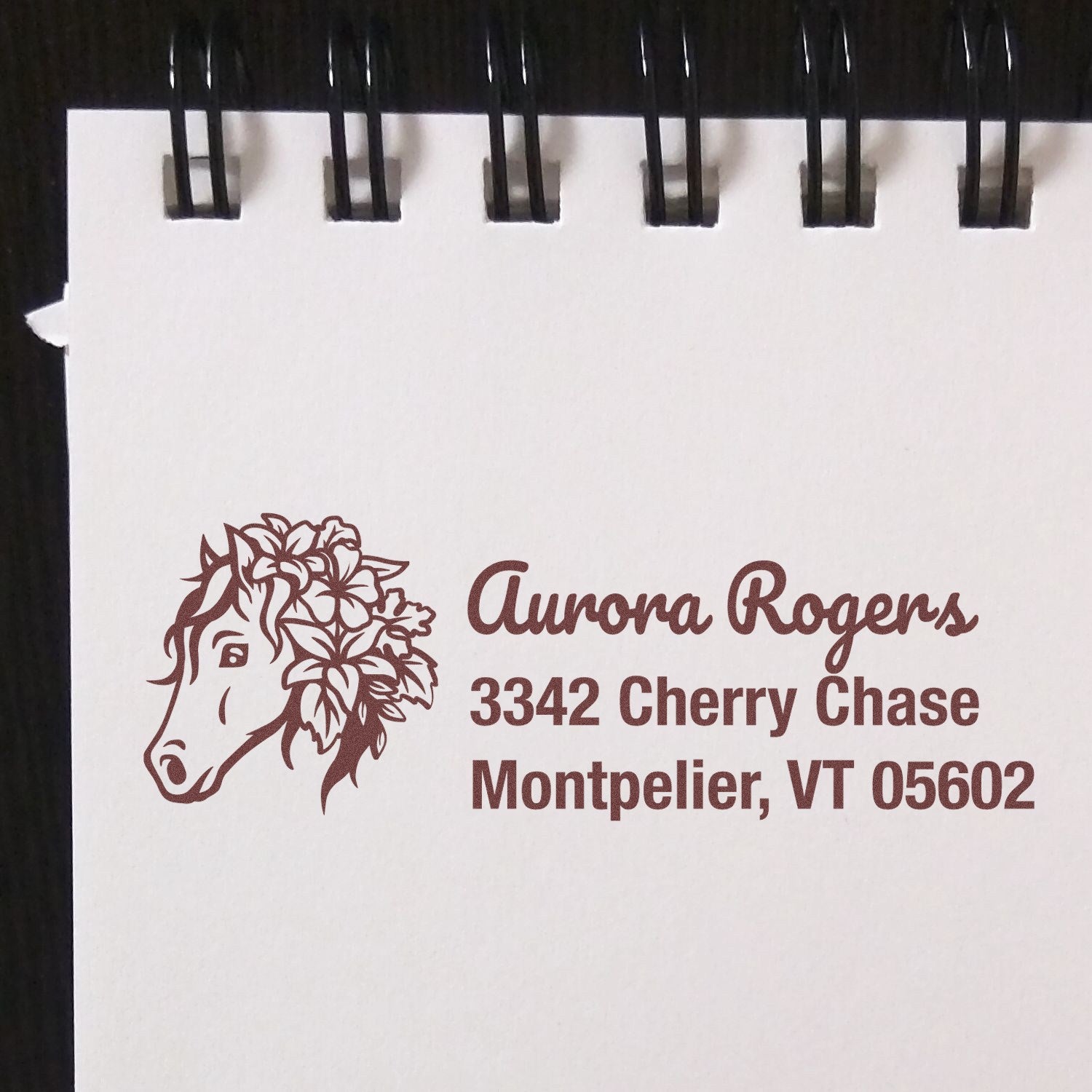 Personalized horse logo address rubber stamp for Aurora Rogers, 3342 Cherry Chase, Montpelier, VT 05602.