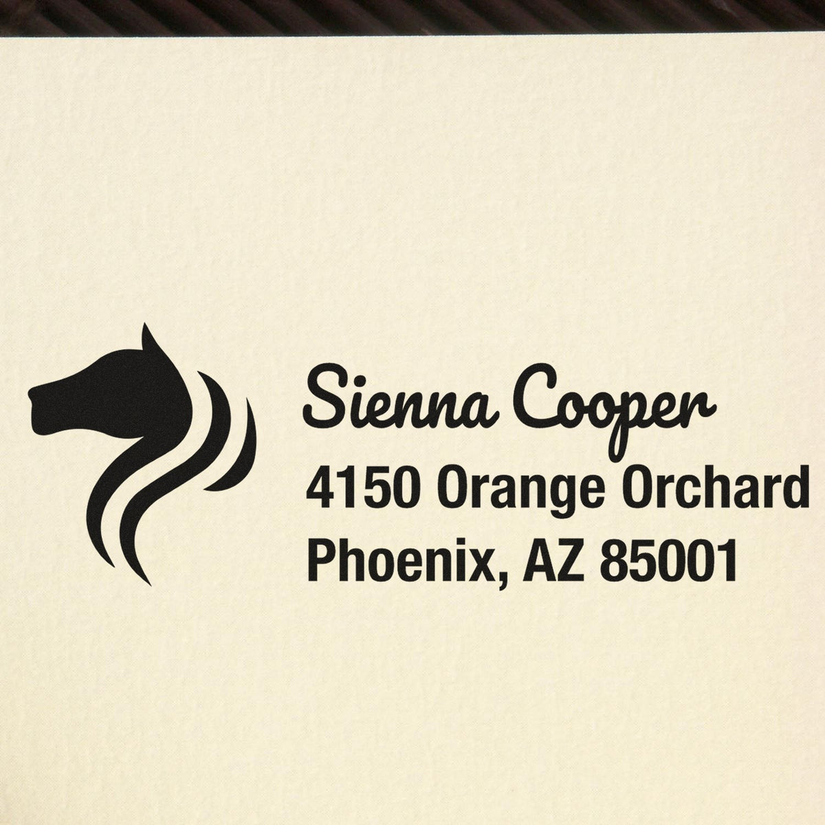 Custom rubber stamp with horse logo, Sienna Cooper, 4150 Orange Orchard, Phoenix, AZ 85001.