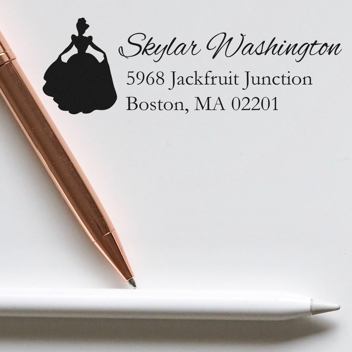 Custom return address rubber stamp for Skylar Washington, featuring a princess silhouette and Boston, MA 02201.