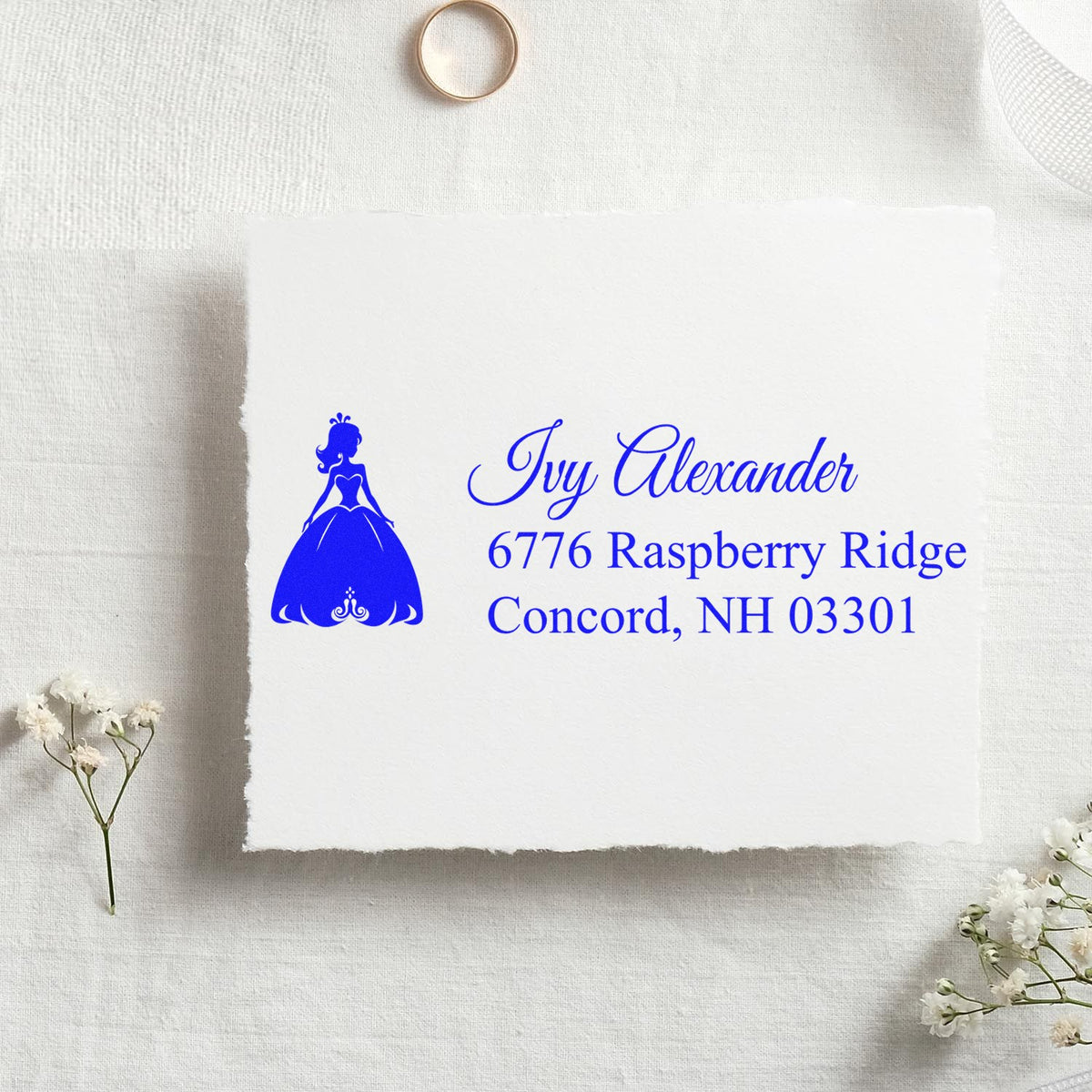 Custom princess address rubber stamp for wedding invitations, featuring Ivy Alexander and Concord, NH return address in blue ink.