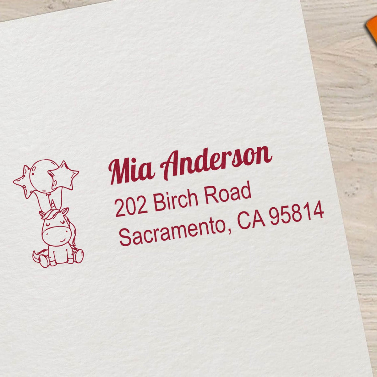 Custom unicorn address rubber stamp for Mia Anderson, featuring a personalized return address for envelopes and mail.
