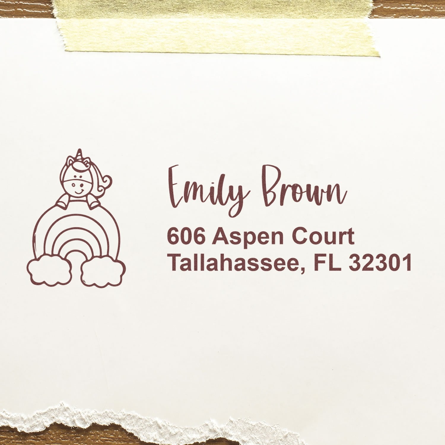 Custom unicorn return address rubber stamp with Emily Brown name and Tallahassee, FL 32301 address.