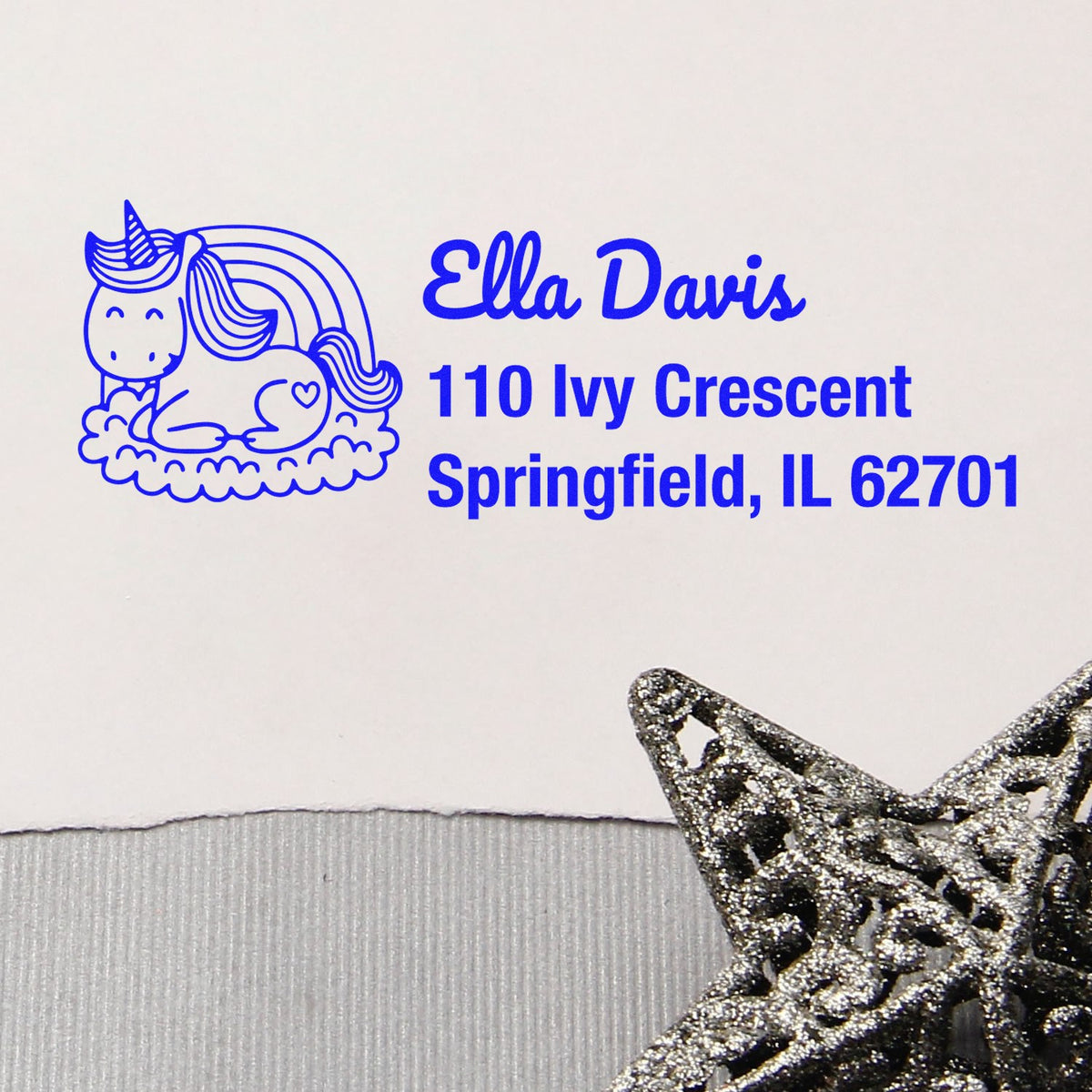 Personalized unicorn rubber address stamp for Ella Davis, 110 Ivy Crescent, Springfield, IL 62701