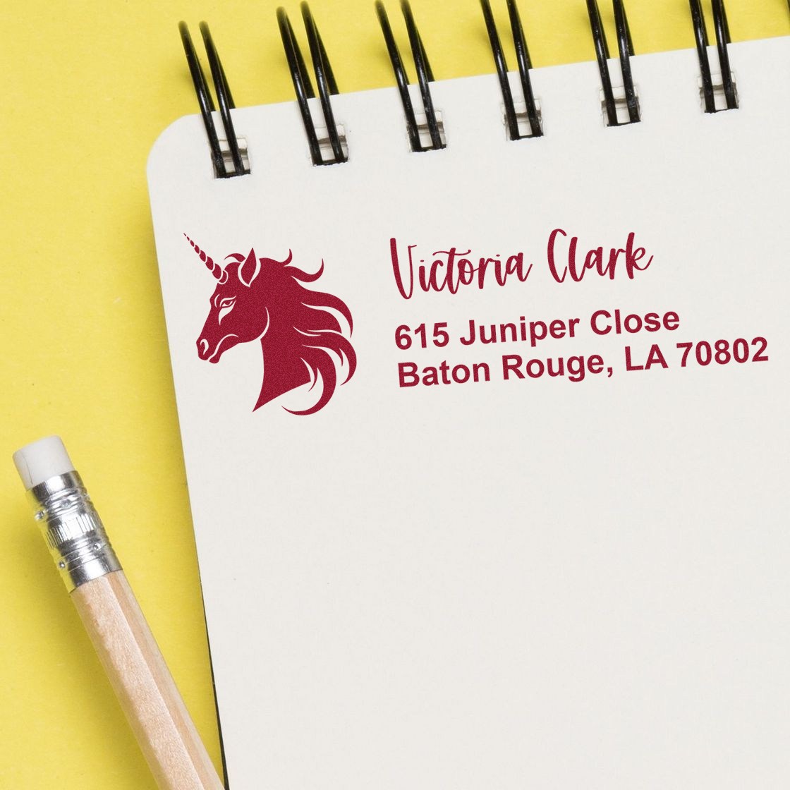 Personalized unicorn return address rubber stamp imprint for business branding, showing name and Baton Rouge, LA address.