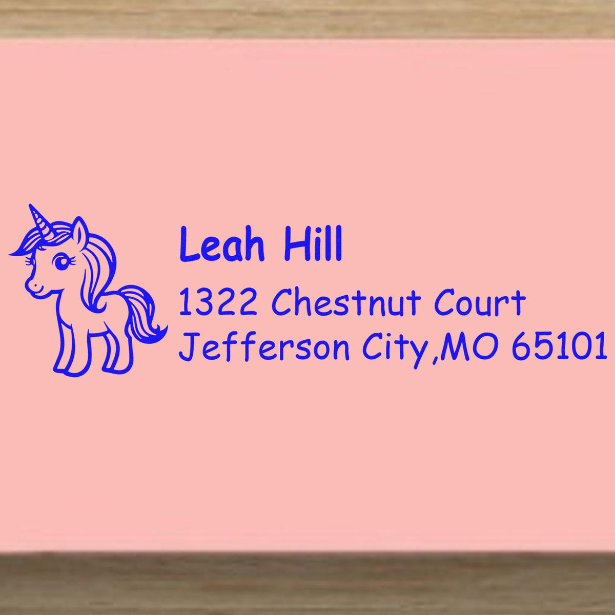 Custom unicorn return address rubber stamp for Leah Hill, Jefferson City, MO 65101