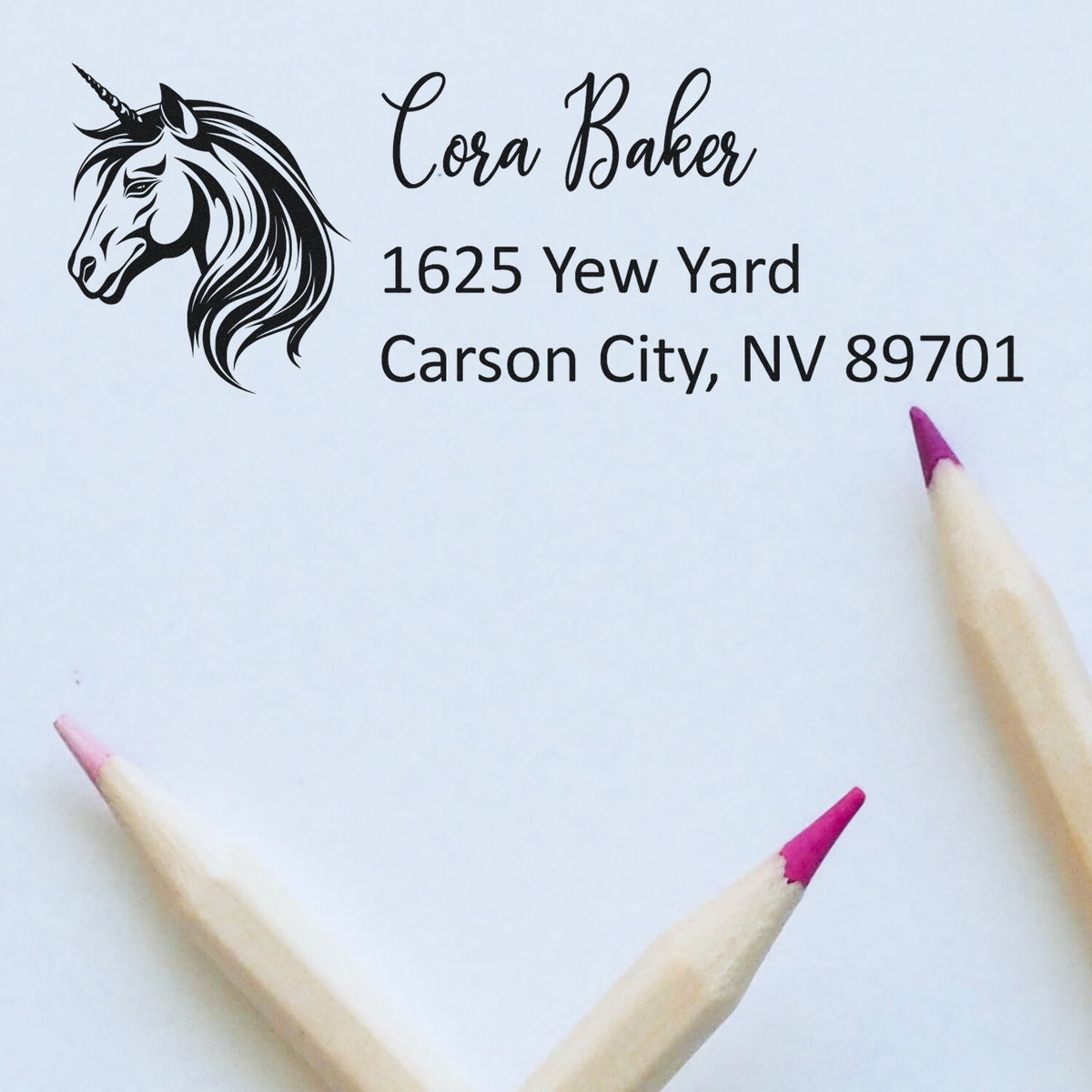 Personalized unicorn return address rubber stamp for Cora Baker, 1625 Yew Yard, Carson City, NV 89701.