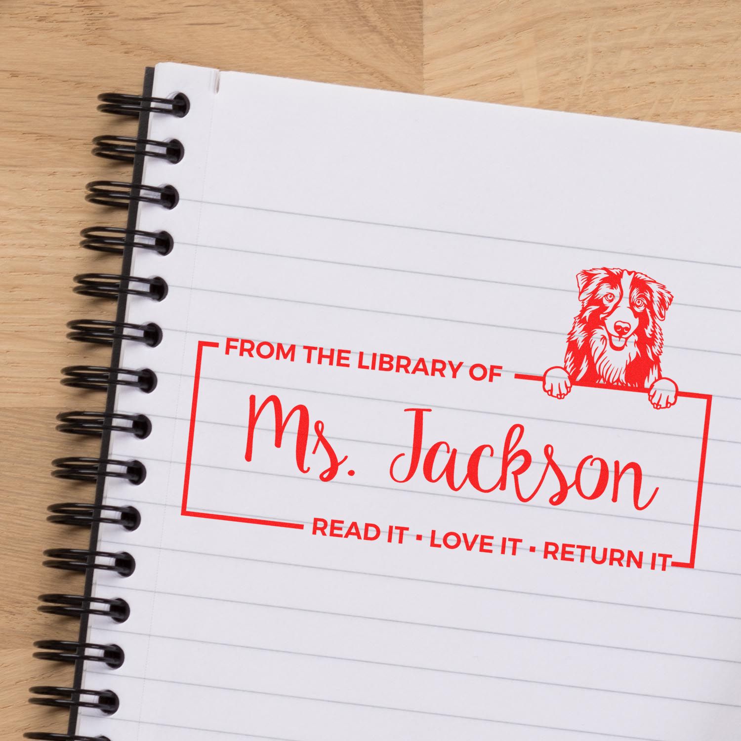 Custom library rubber stamp for Ms. Jackson with dog design and Read it, Love it, Return it book label.