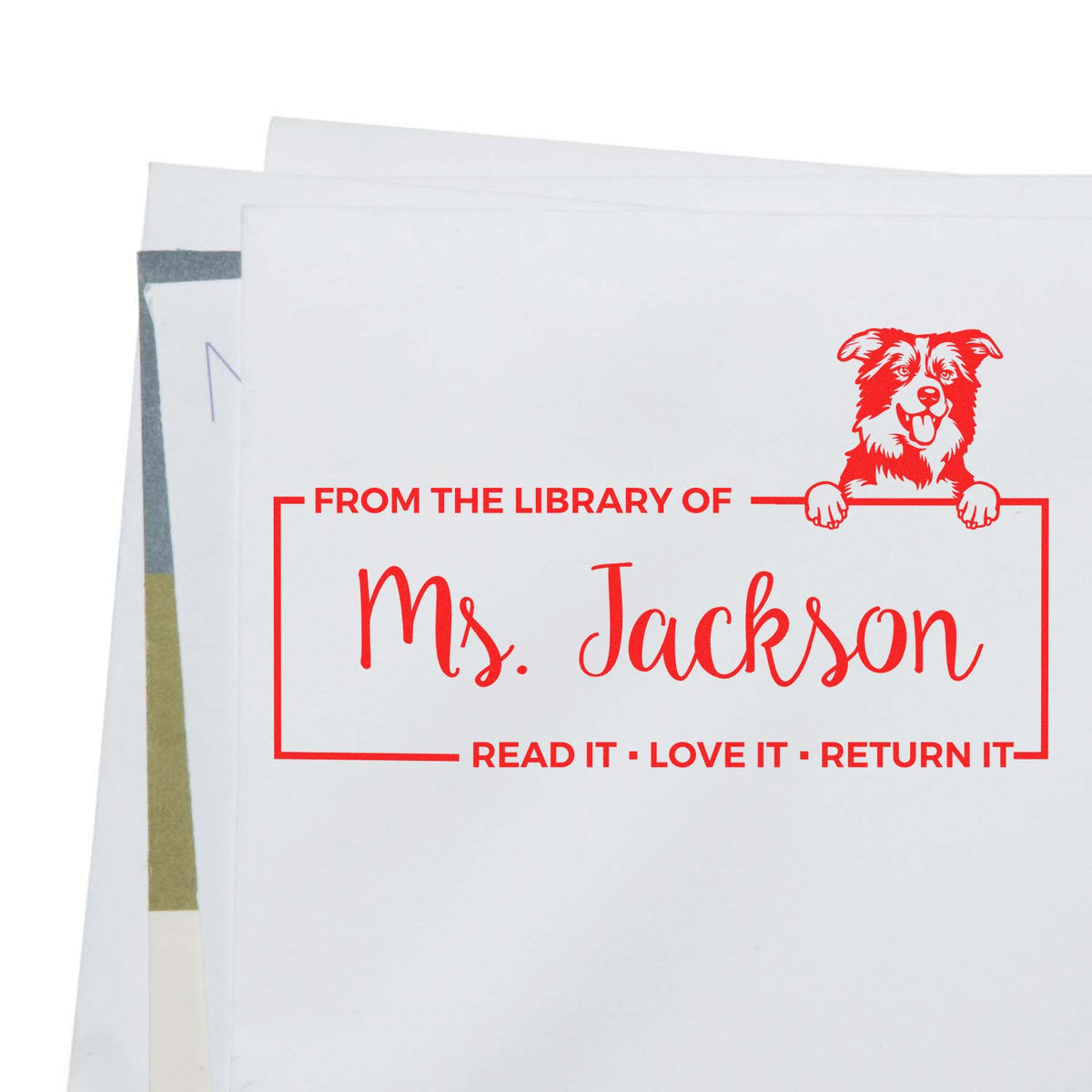 Personalized library book stamp with dog design for Ms. Jackson, reading From the Library OfRead It, Love It, Return It.