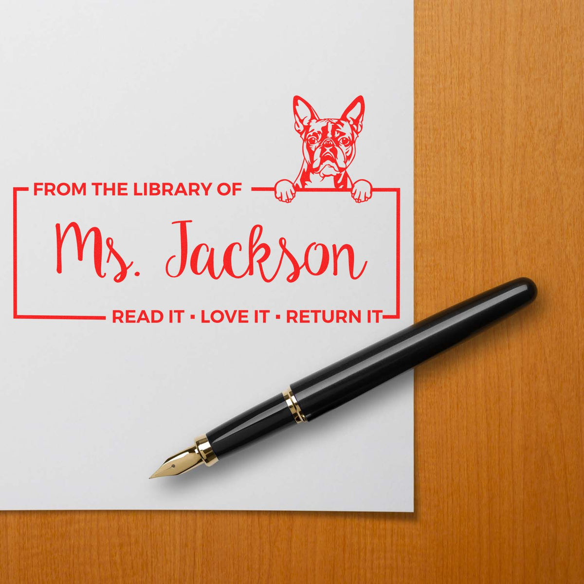 Personalized dog library rubber stamp for Ms. Jackson with Read it, love it, return it book return message.