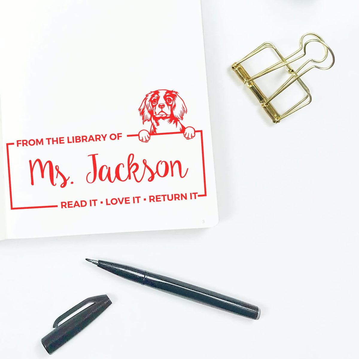 Custom personalized library book rubber stamp for Ms. Jackson with dog design and Read it, Love it, Return it message