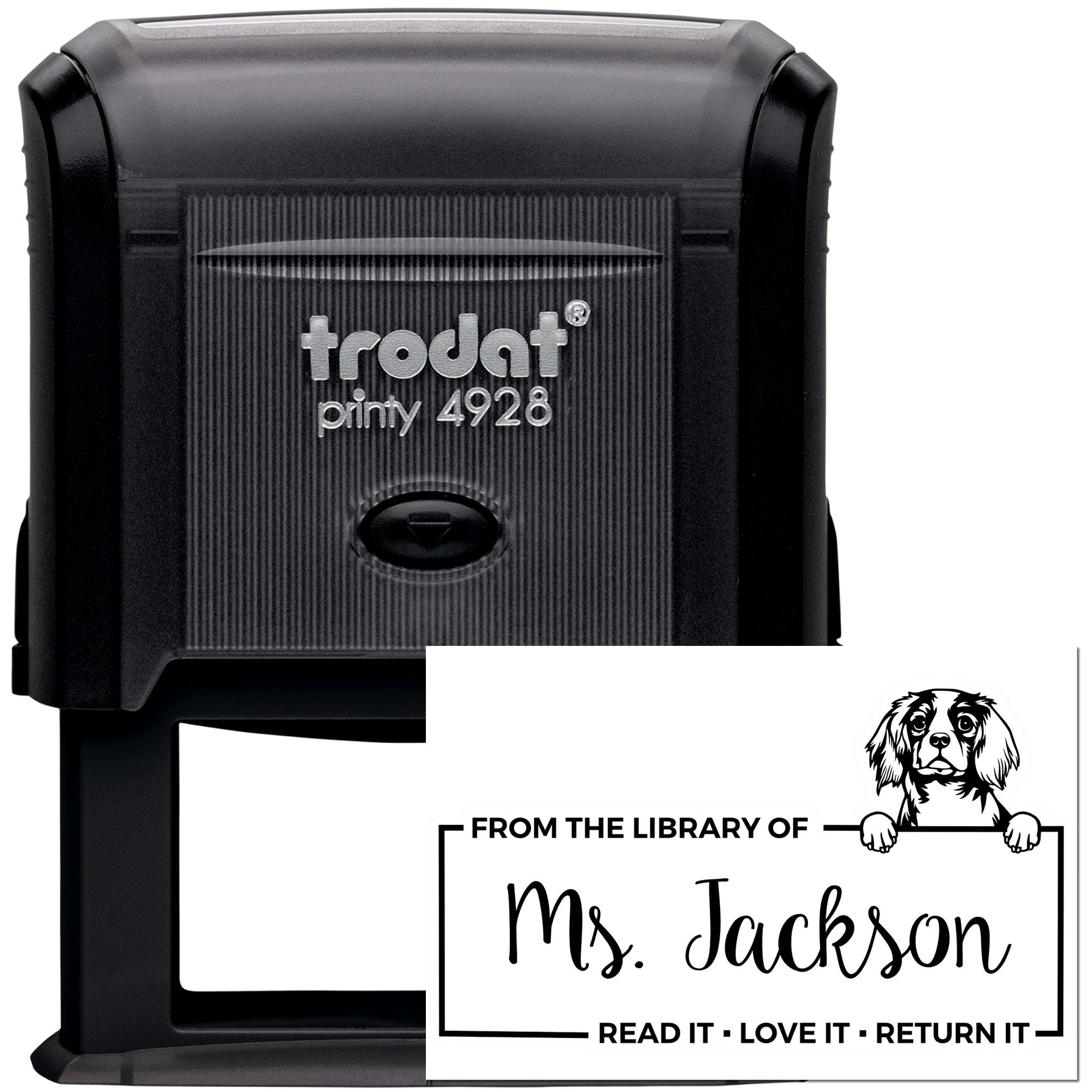 Personalized self-inking rubber stamp for library books, featuring dog artwork and From the Library of Ms. Jackson return message.