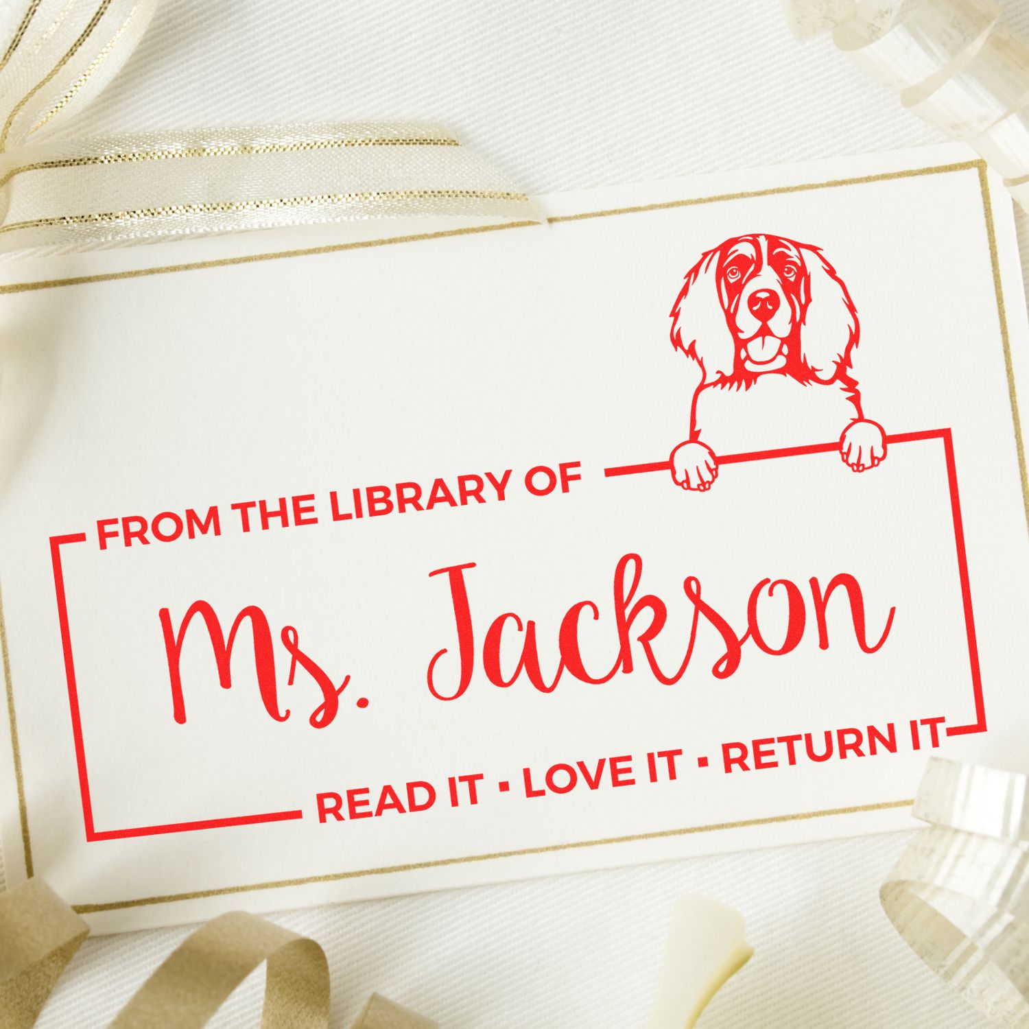 Custom dog library bookplate rubber stamp for Ms. Jackson, featuring Read it, Love It, Return It personalized book label.