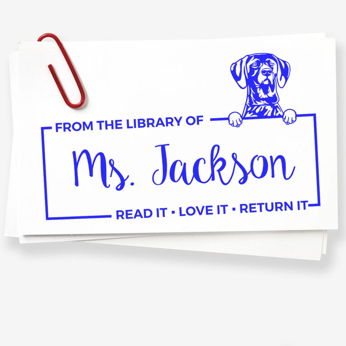 Personalized rubber library stamp for Ms. Jackson with dog design, Read It, Love It, Return It book return message.