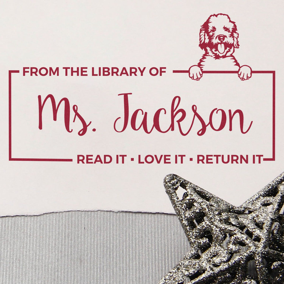 Custom dog library rubber stamp for Ms. Jackson with From the Library Of and Read It, Love It, Return It text.