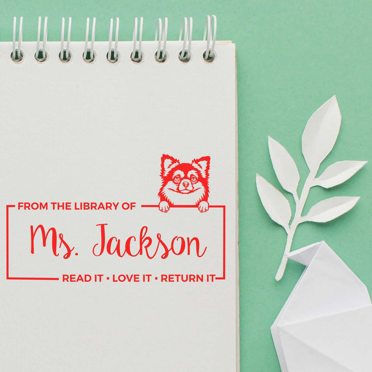 Custom library rubber stamp for books, reading From the Library of Ms. Jackson with fox and return-it message.