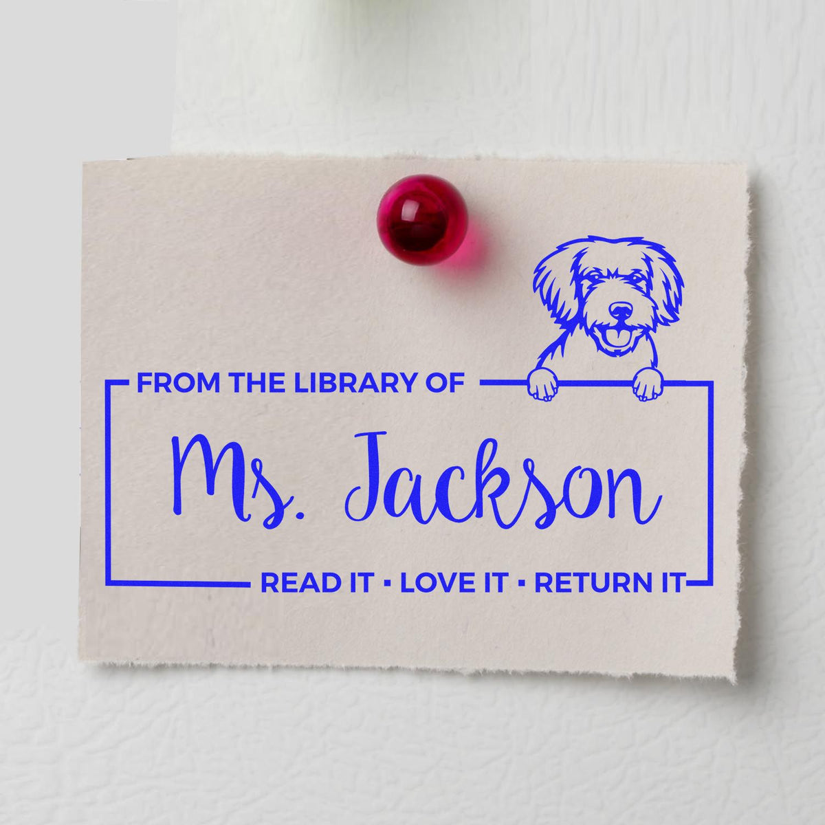Personalized library rubber stamp for Ms. Jackson with dog art and Read it, Love it, Return it book return message.