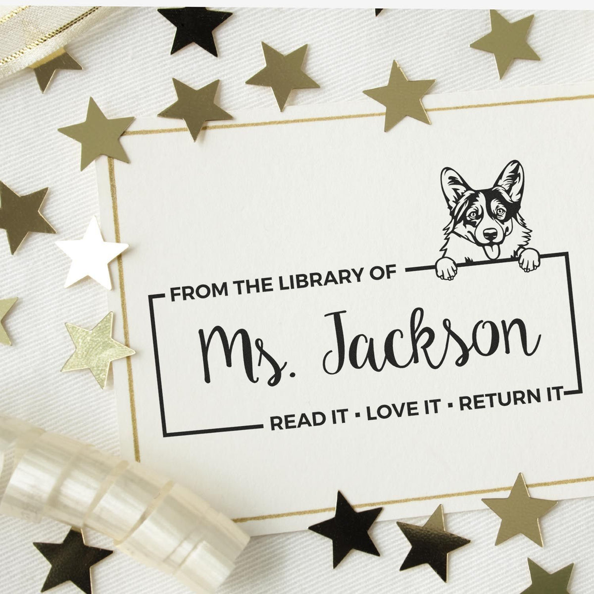 Personalized corgi library rubber stamp bookplate for Ms. Jackson, with Read it, Love it, Return it reading label.