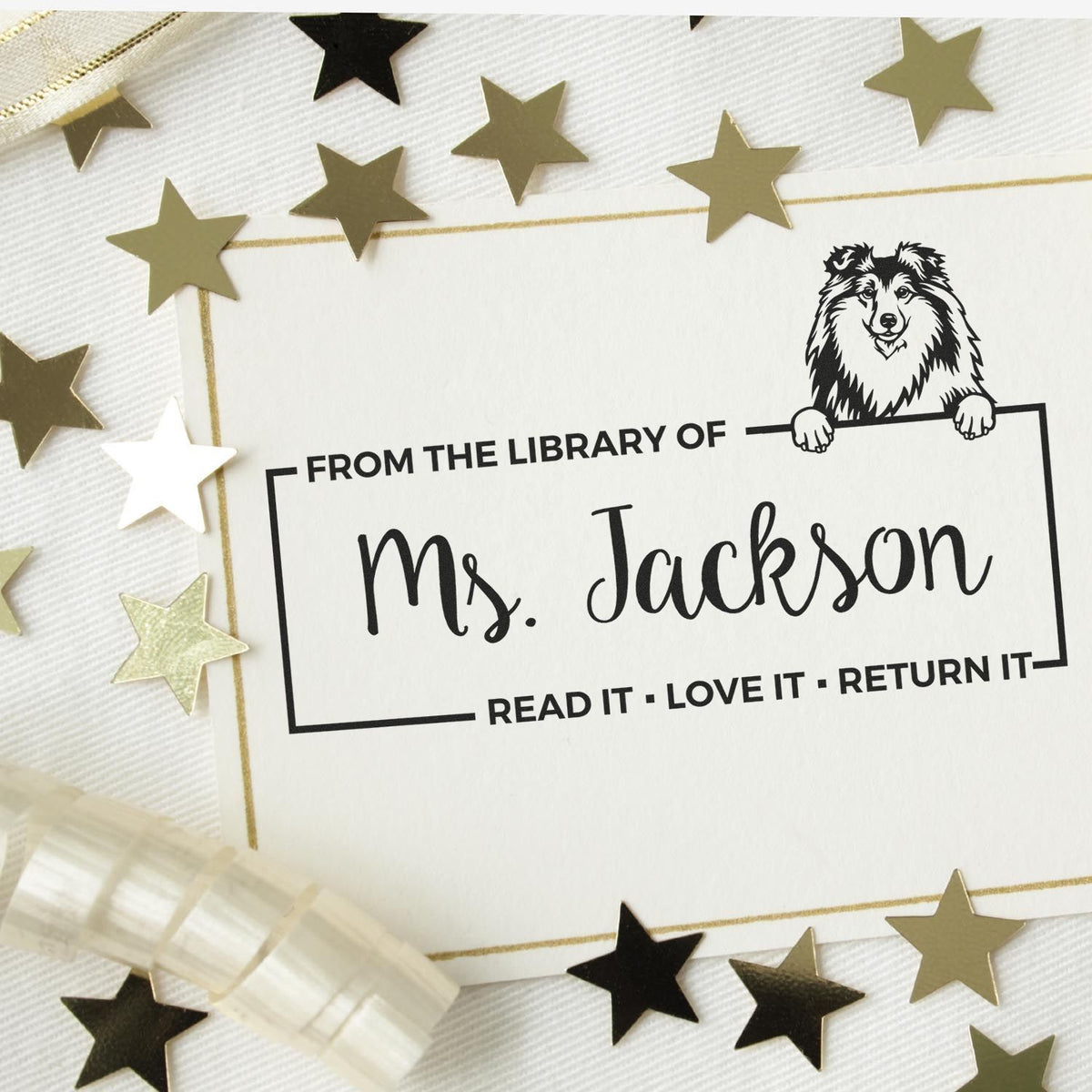 Custom library book rubber stamp for Ms. Jackson with dog illustration and Read It, Love It, Return It text.
