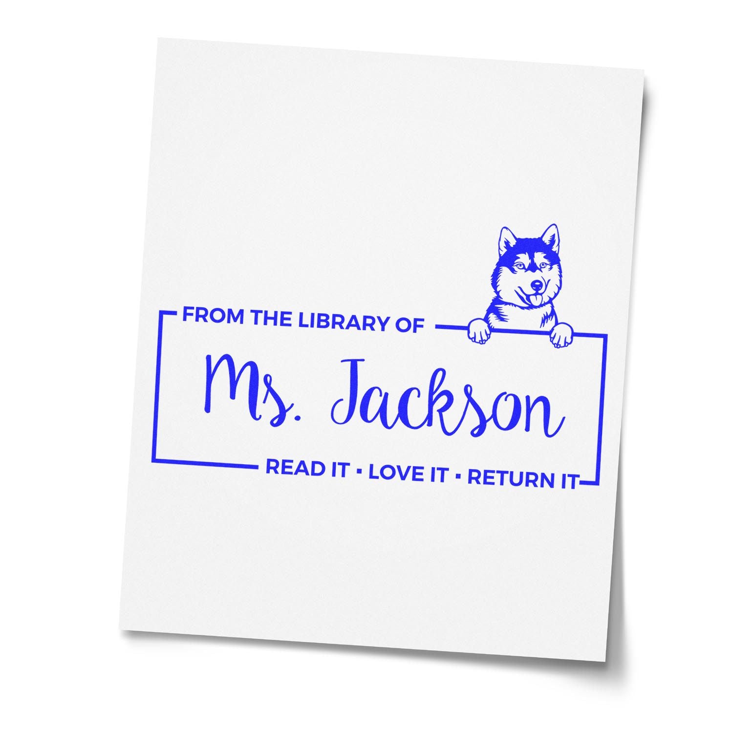 Custom library book stamp for Ms. Jackson with husky dog design and Read it, love it, return it message.