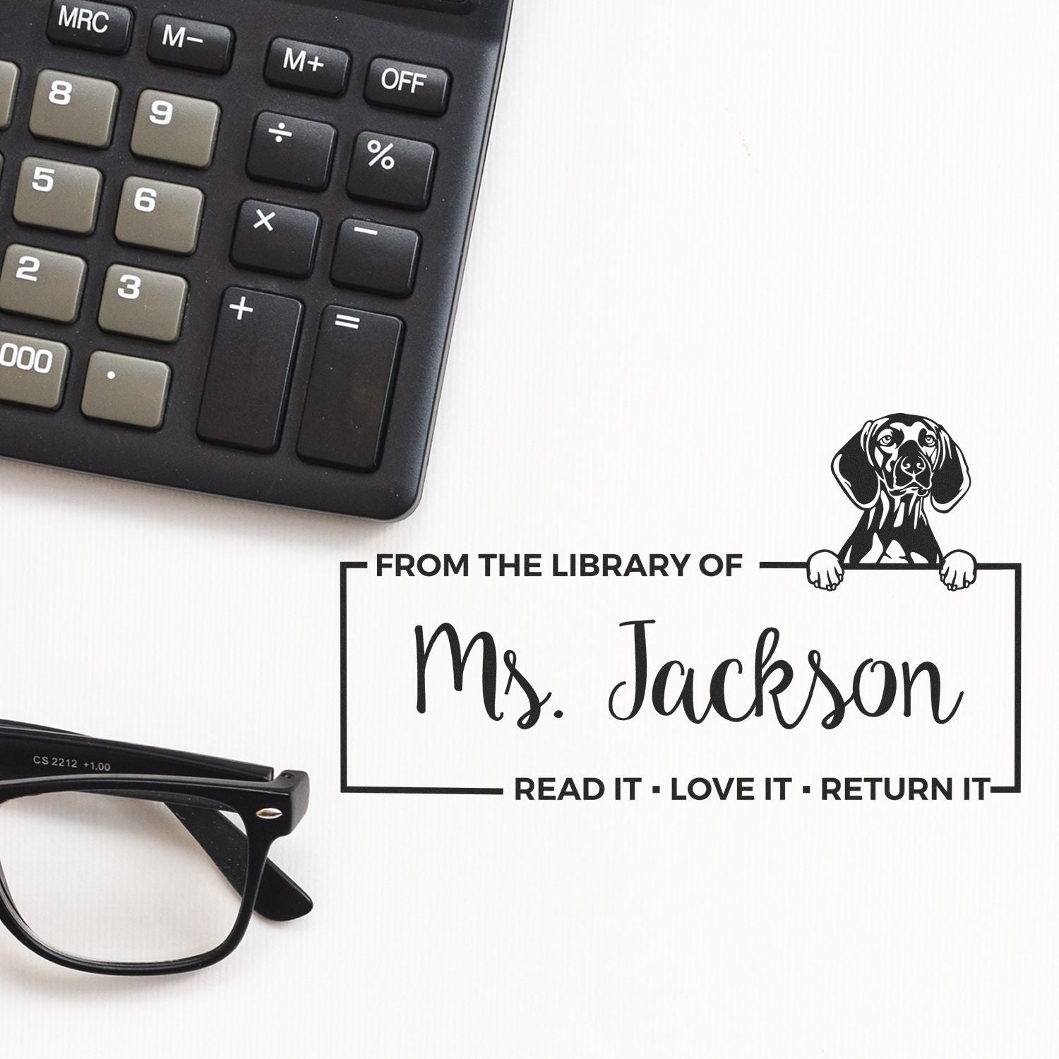 Personalized library rubber stamp with dog design, reading From the Library of Ms. Jackson Read It, Love It, Return It.