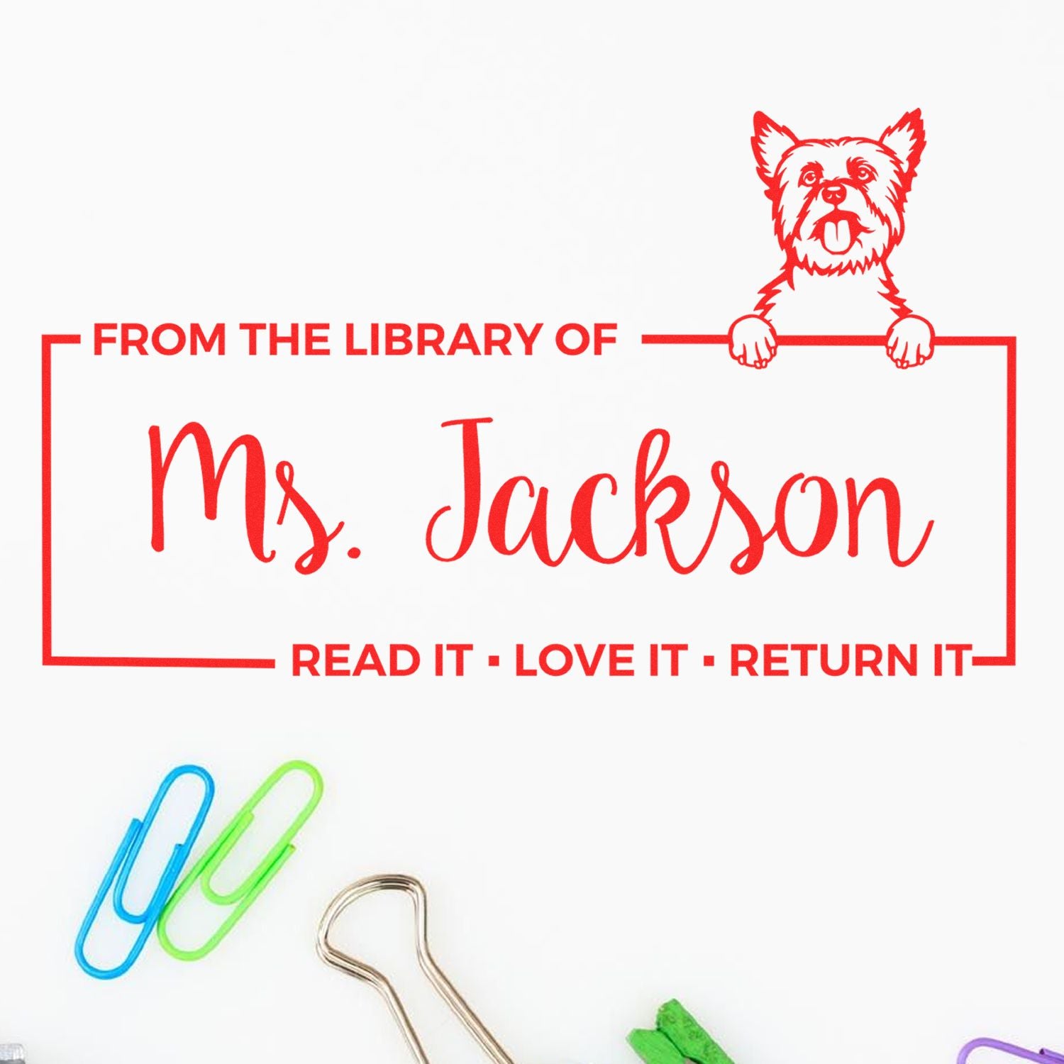 Personalized library rubber stamp for Ms. Jackson with dog graphic and Read It, Love It, Return It book label.