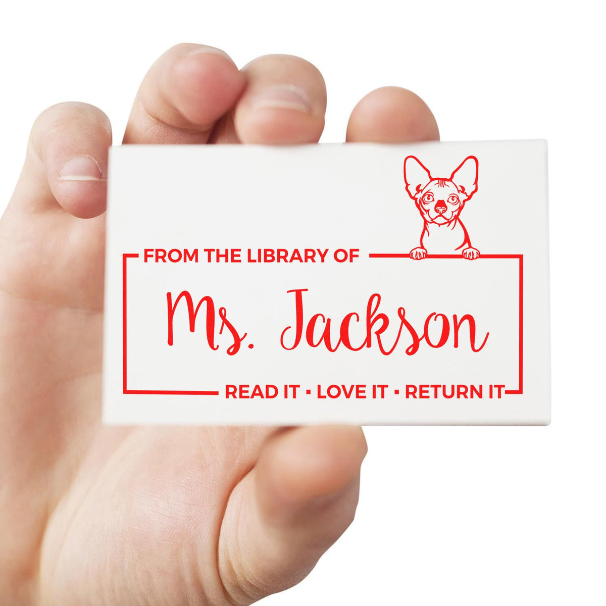 Custom library rubber stamp with dog illustration, From the Library of Ms. Jackson and Read it, Love it, Return it.