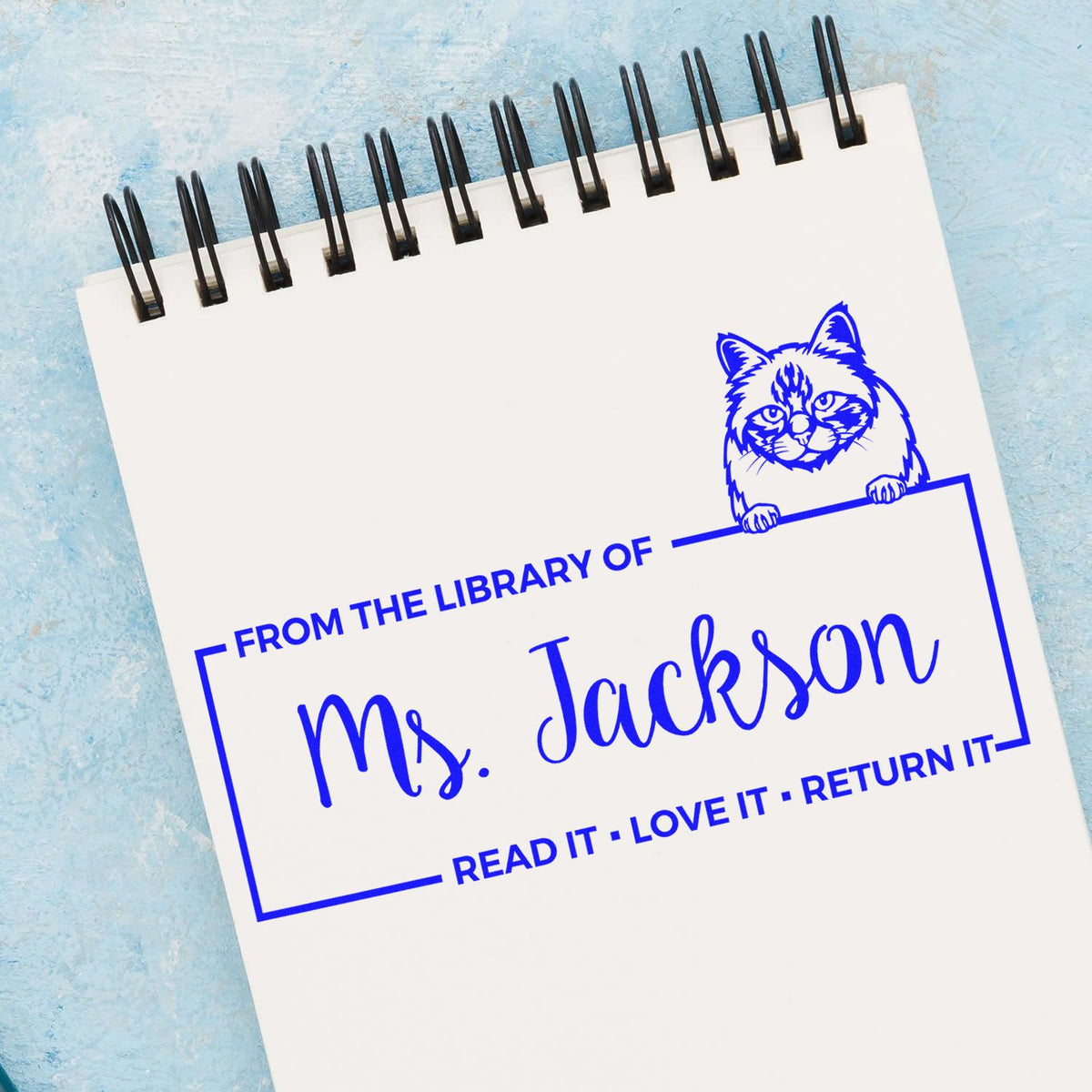 Personalized cat library rubber stamp with From the Library of Ms. Jackson and Read It, Love It, Return It design.