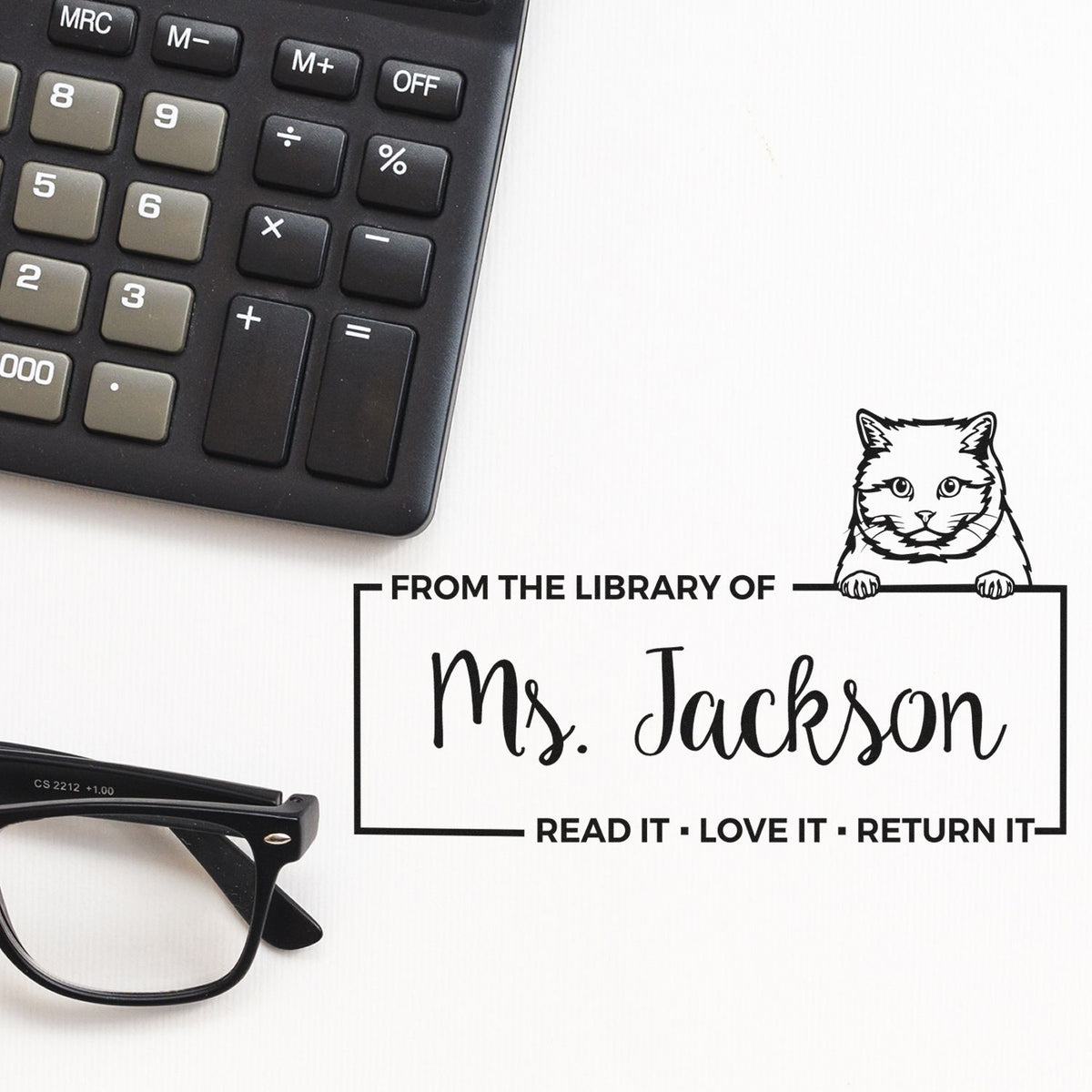 Personalized library book stamp for Ms. Jackson with cat design and Read it, love it, return it message.