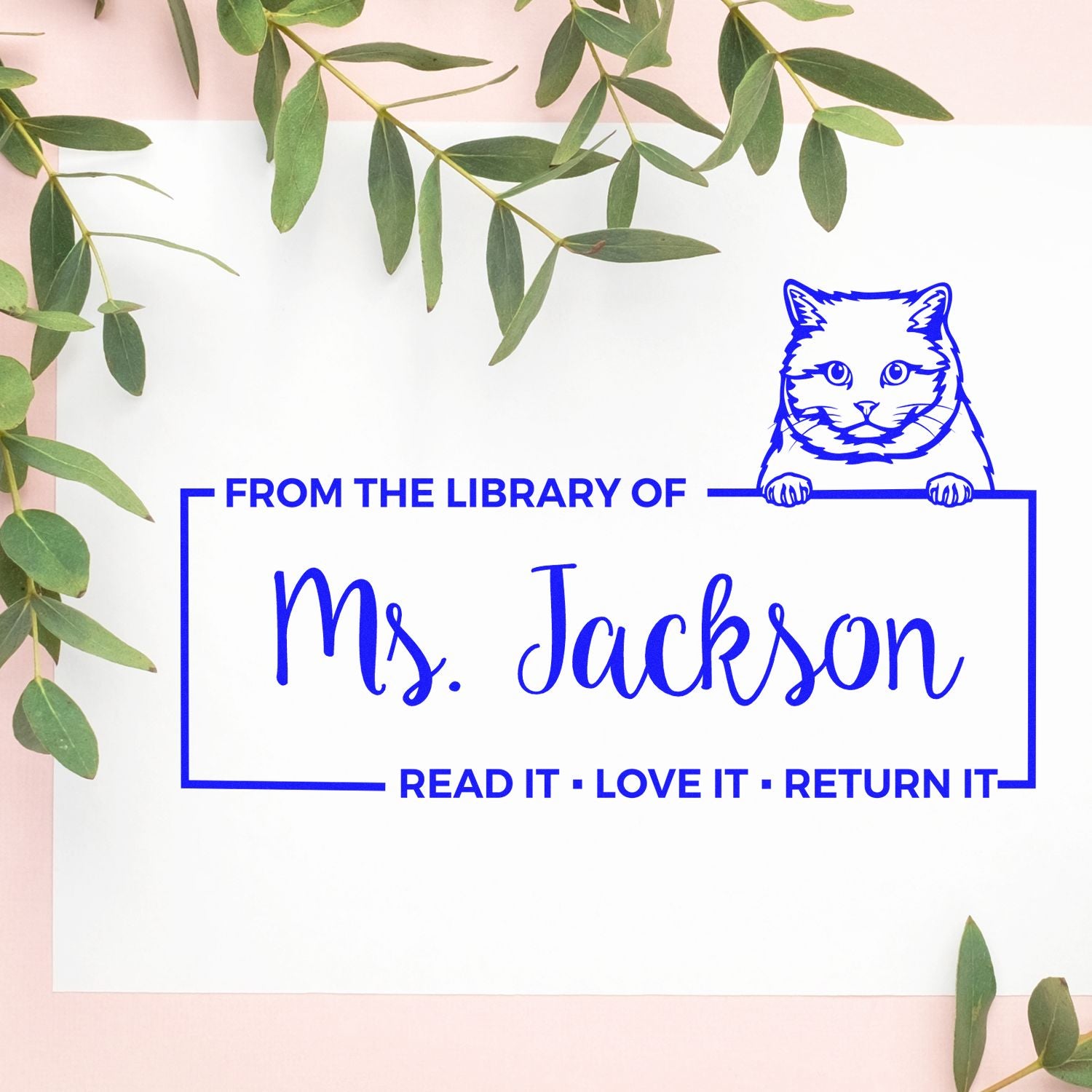 Custom rubber library stamp for Ms. Jackson with cat design, reading From the Library of and Read It, Love It, Return It.