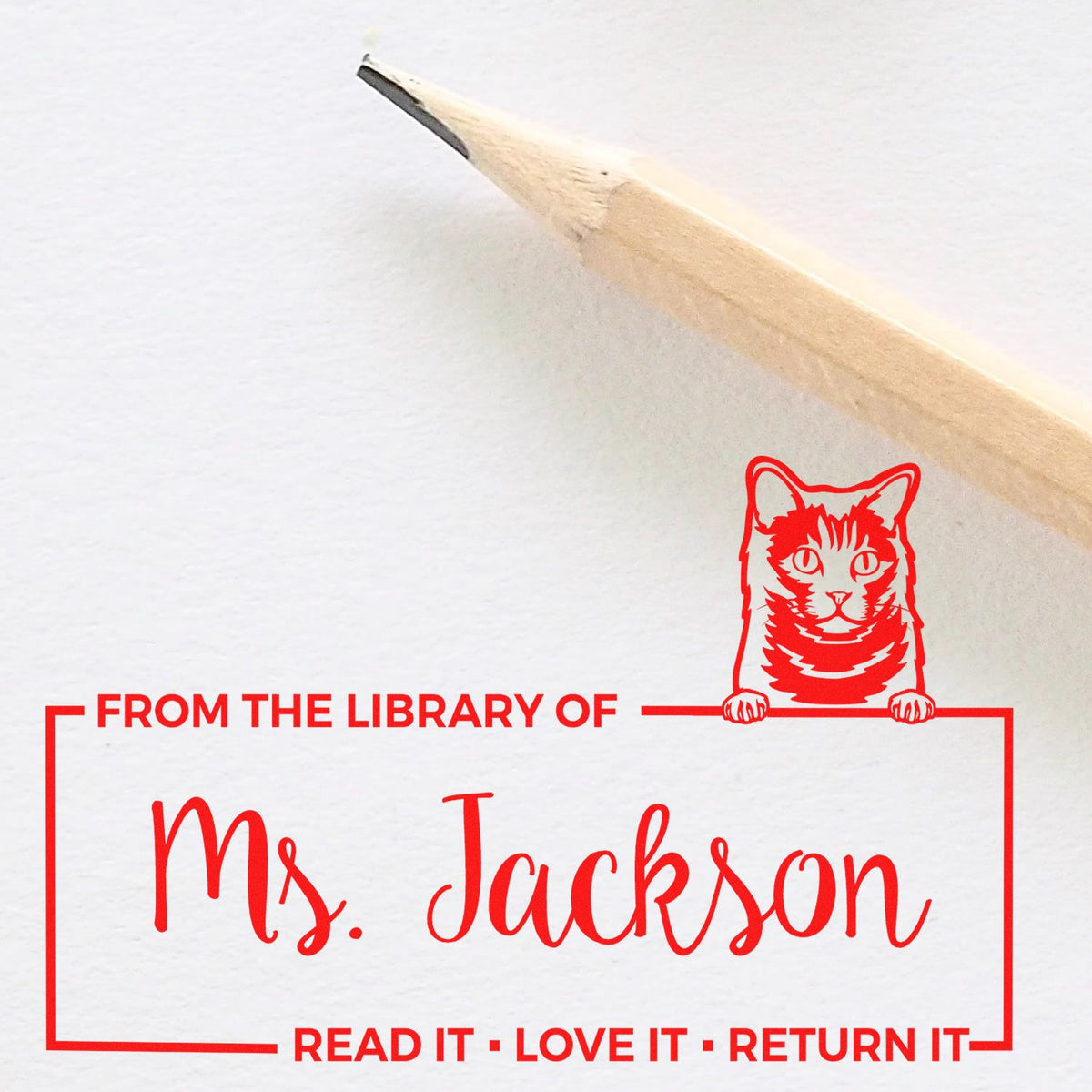 Personalized library rubber stamp with cat, From the Library of Ms. Jackson and Read It Love It Return It.