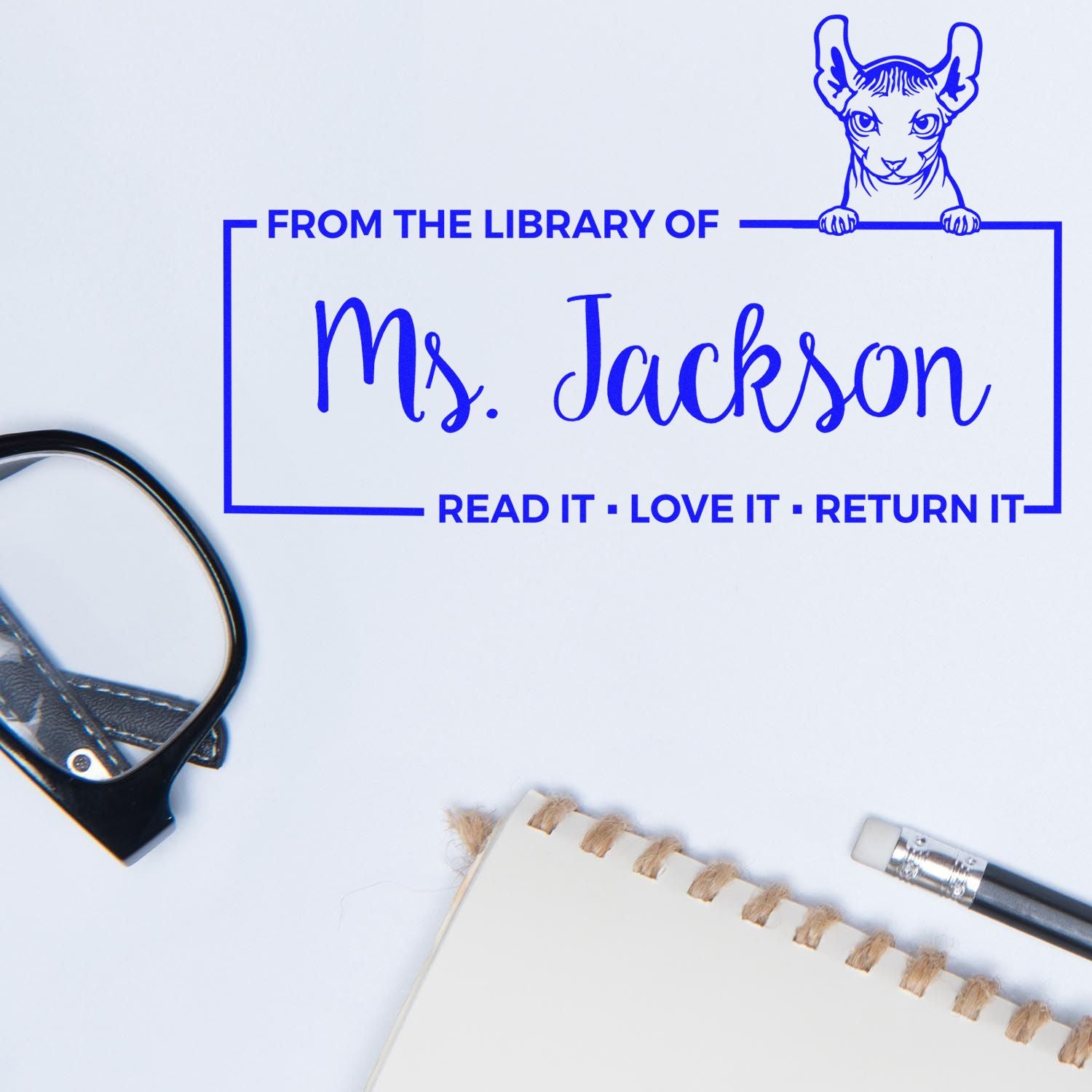 Custom rubber library stamp with cat design, From the Library of Ms. Jackson, for personalized book labeling and return reminders.