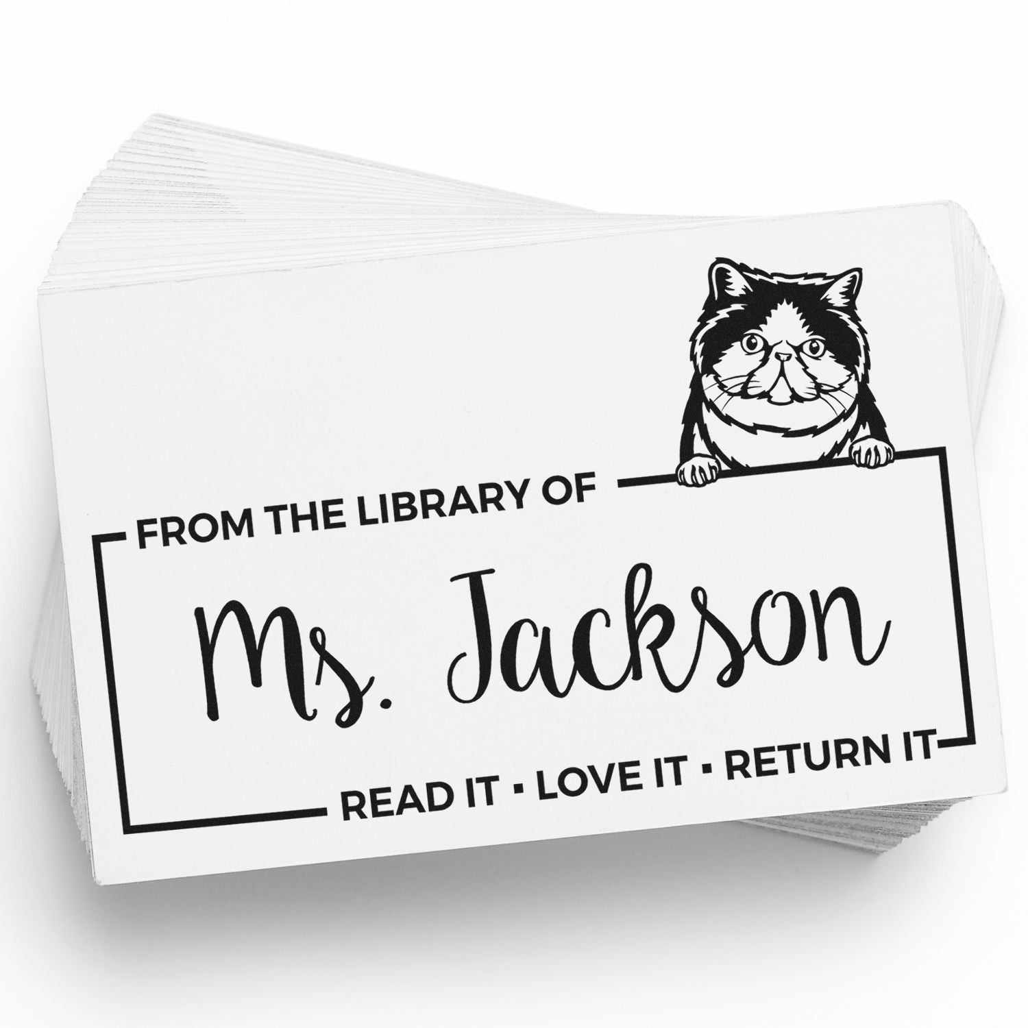 Custom rubber library book stamp with cat design for Ms. Jackson, marking books Read it, love it, return it.