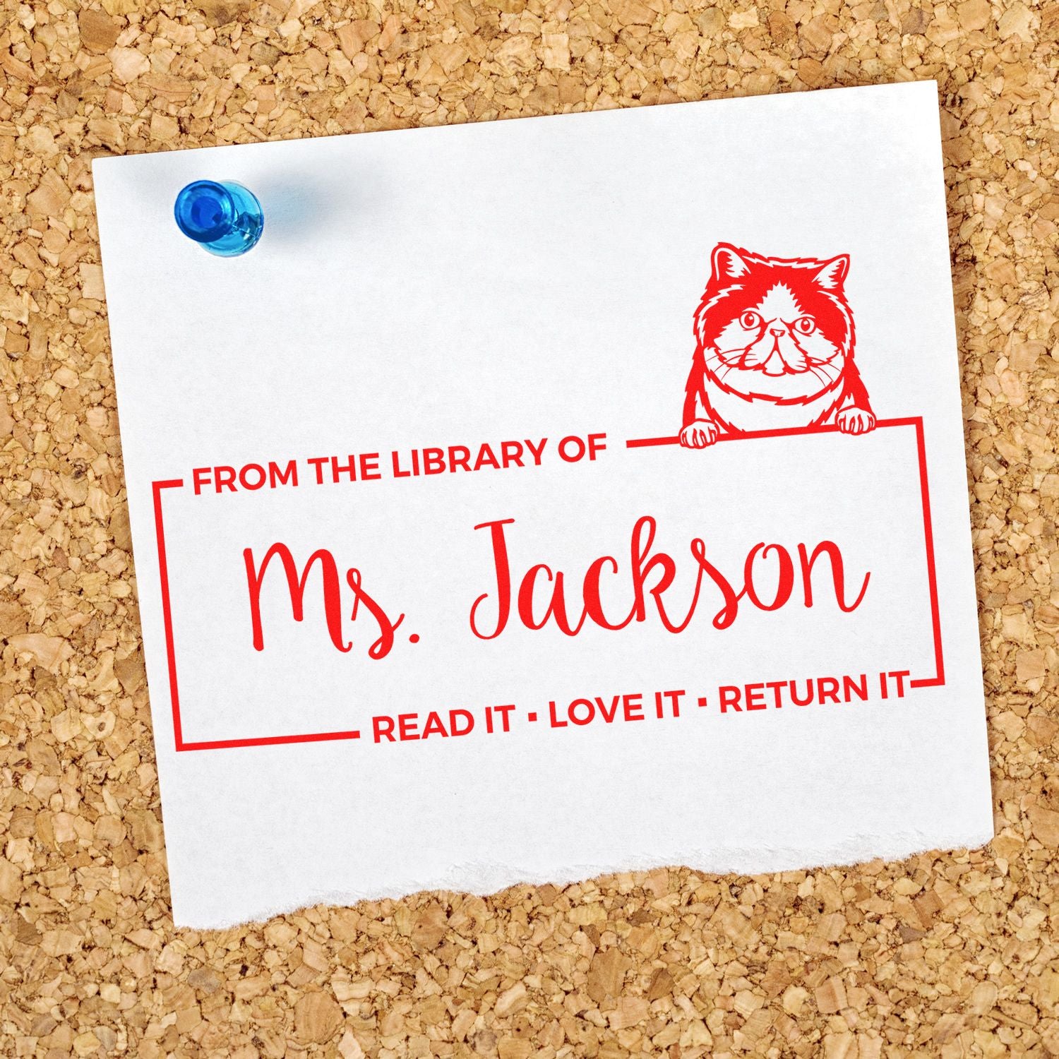 Personalized library rubber stamp with cat design, Ms. Jackson name, and book return message on pinned paper.