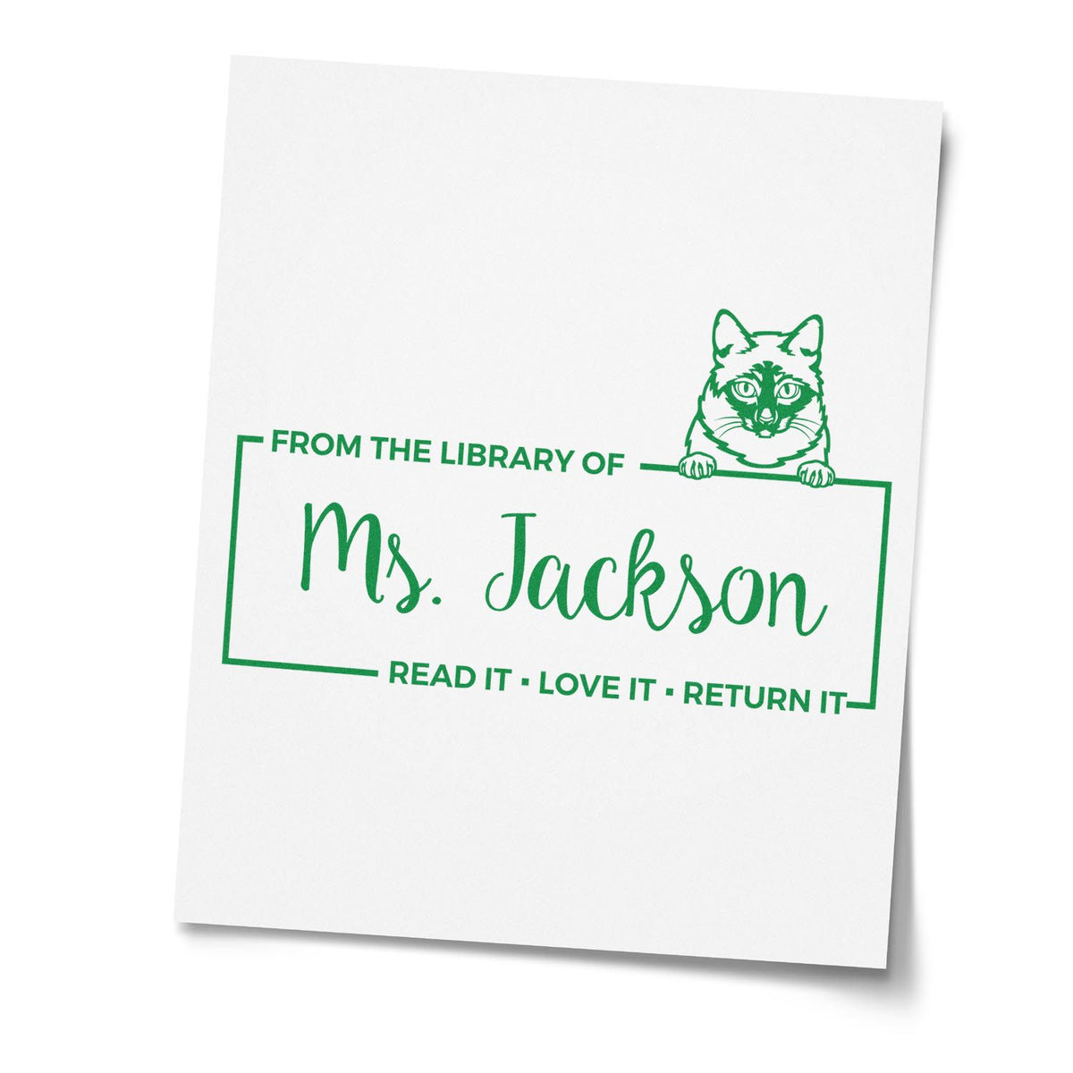 Personalized library book rubber stamp with cat design, From the Library of Ms. Jackson, and read-it-return-it text.