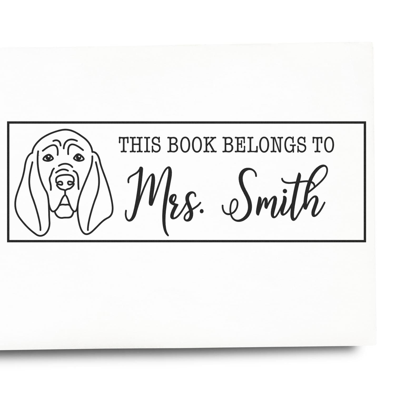Personalized book stamp with dog illustration, reading This Book Belongs to Mrs. Smith for custom library book labeling.