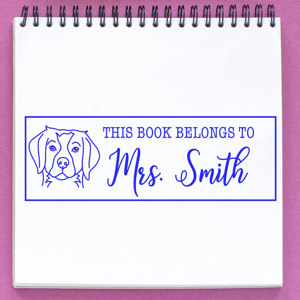 Custom dog bookplate rubber stamp with This Book Belongs to Mrs. Smith for personalized library books.