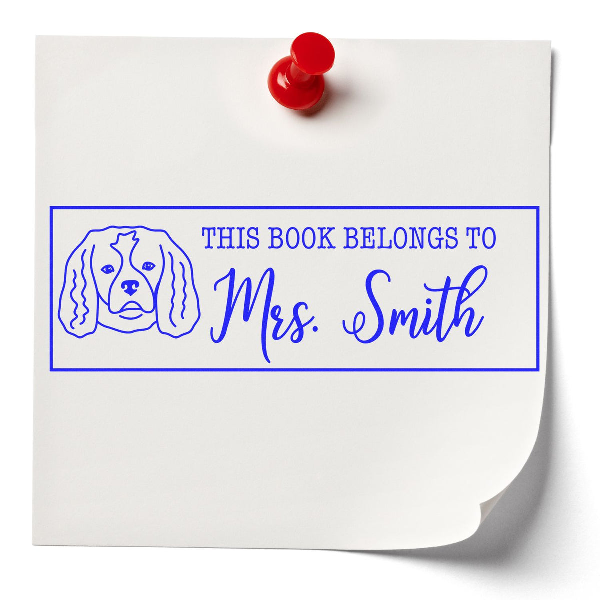 Custom dog book stamp with This Book Belongs to Mrs. Smith for personalized library books and home reading collections.