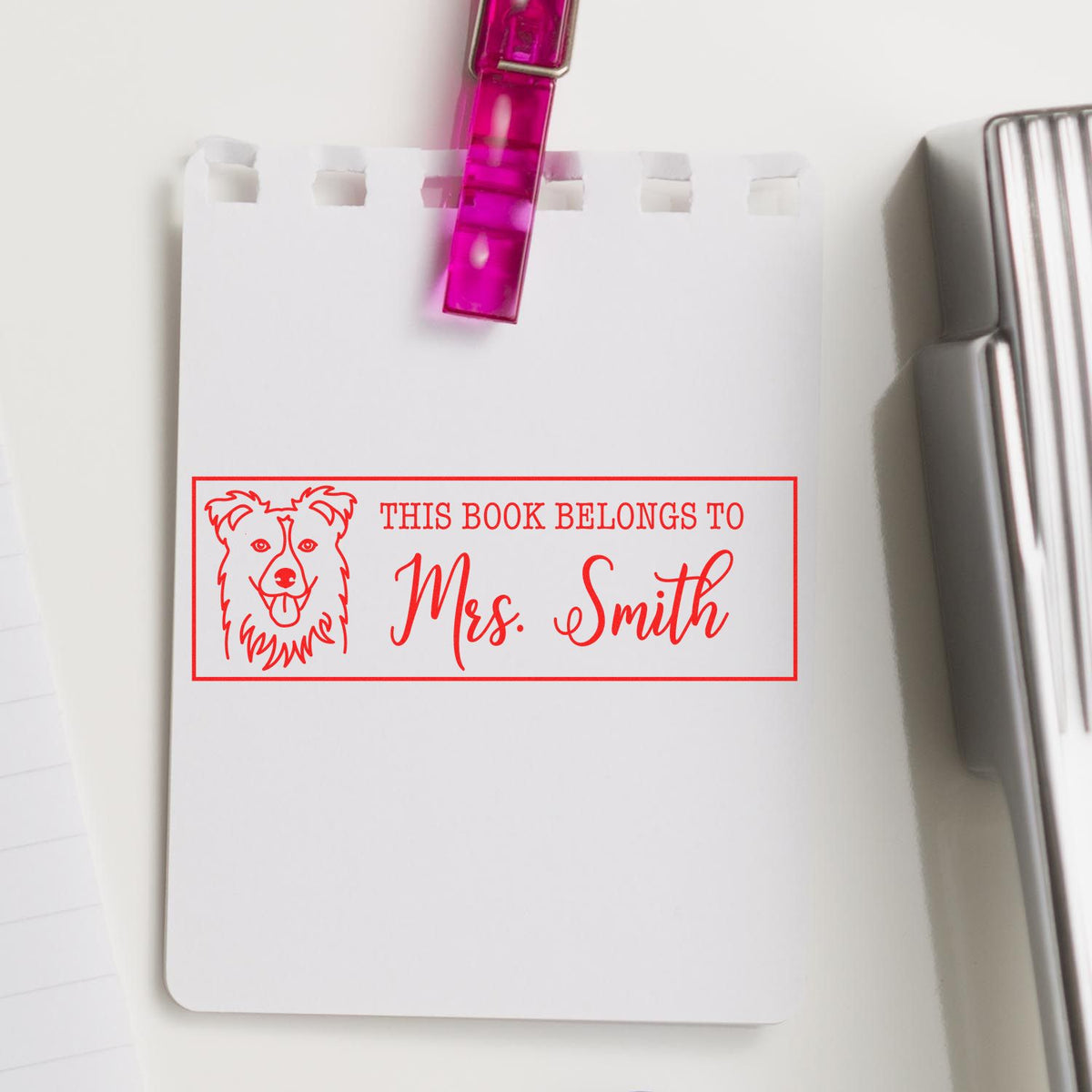Custom book belongs to Mrs. Smith rubber stamp with dog design, ideal for personalizing library books and notebooks.