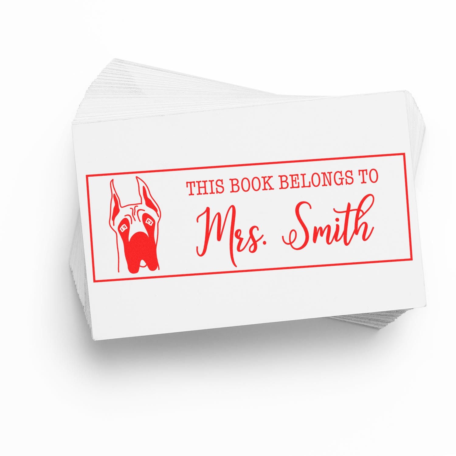 Personalized rubber book stamp for Mrs. Smith with dog illustration and This Book Belongs To text for library books.