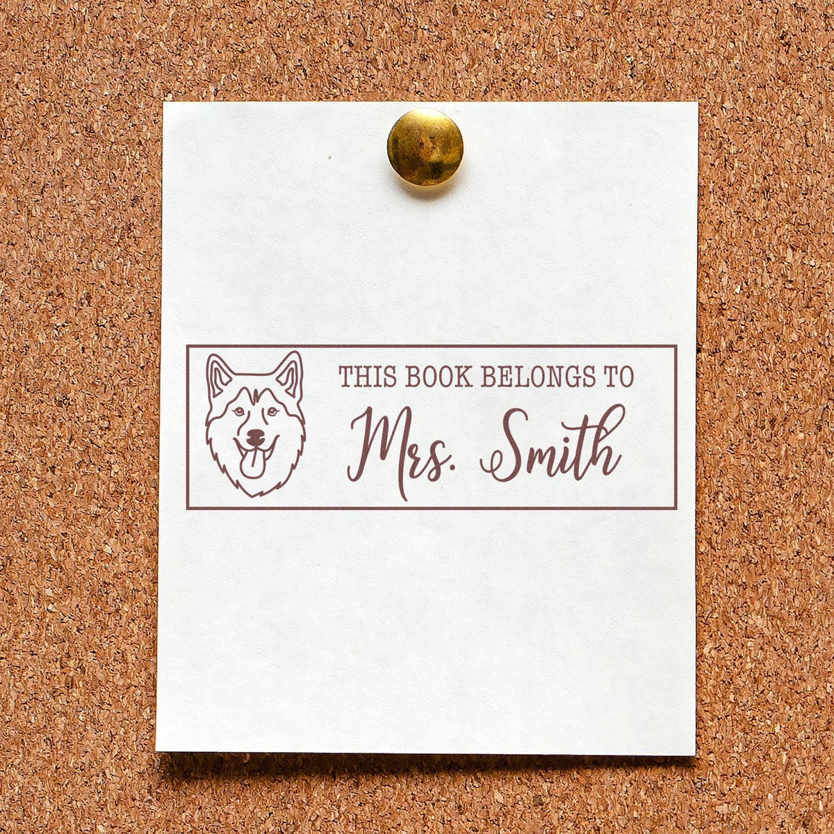 Custom rubber stamp for books with dog illustration and This Book Belongs to Mrs. Smith personalized bookplate.