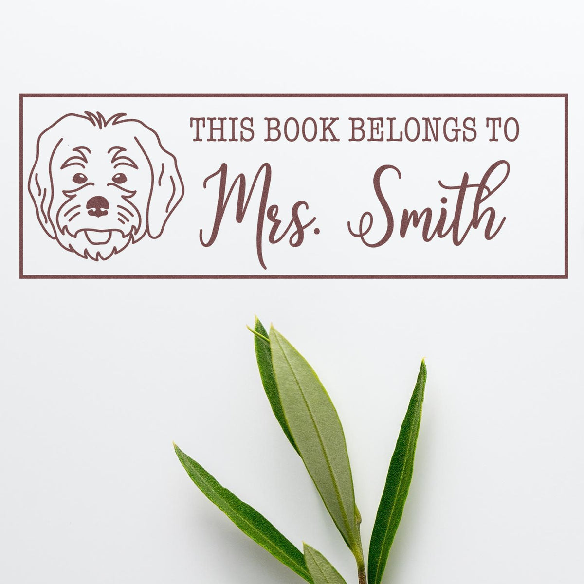 Custom dog bookplate rubber stamp for personalized books, reading This Book Belongs to Mrs. Smith.