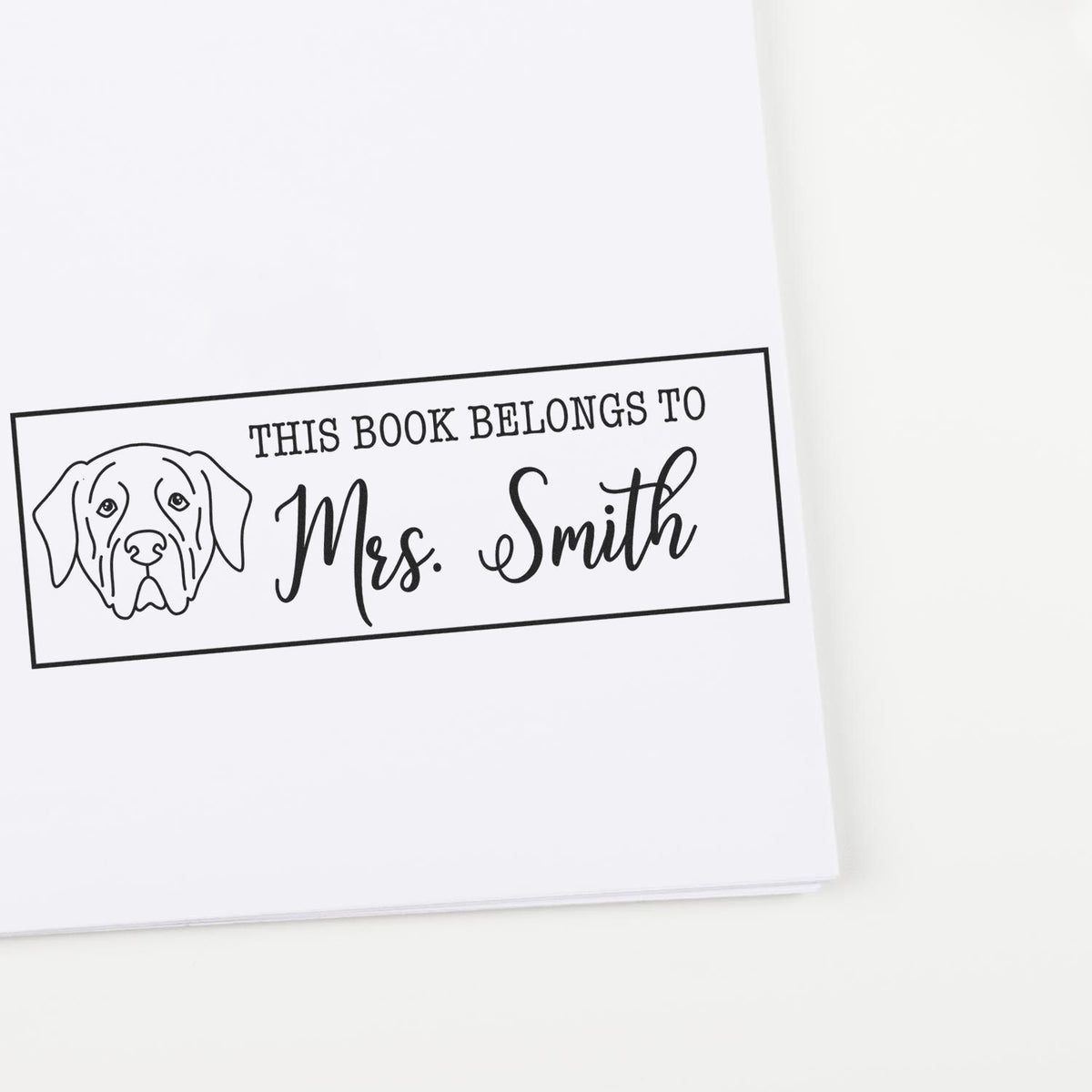 Custom rubber stamp book plate with dog illustration for Mrs. Smith, perfect for personalizing books and library collections.
