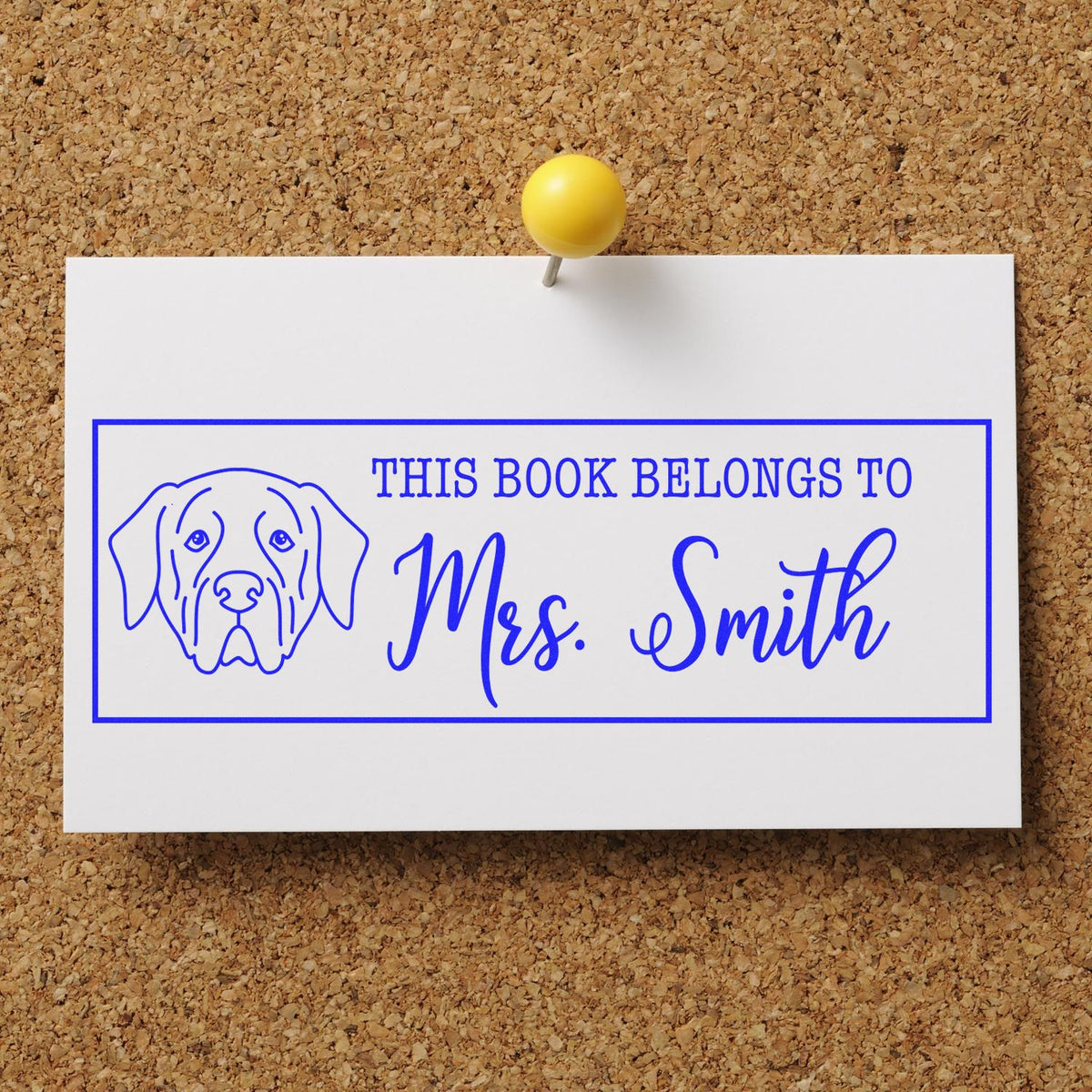 Personalized dog-themed book stamp reading This book belongs to Mrs. Smith for marking books and school libraries.